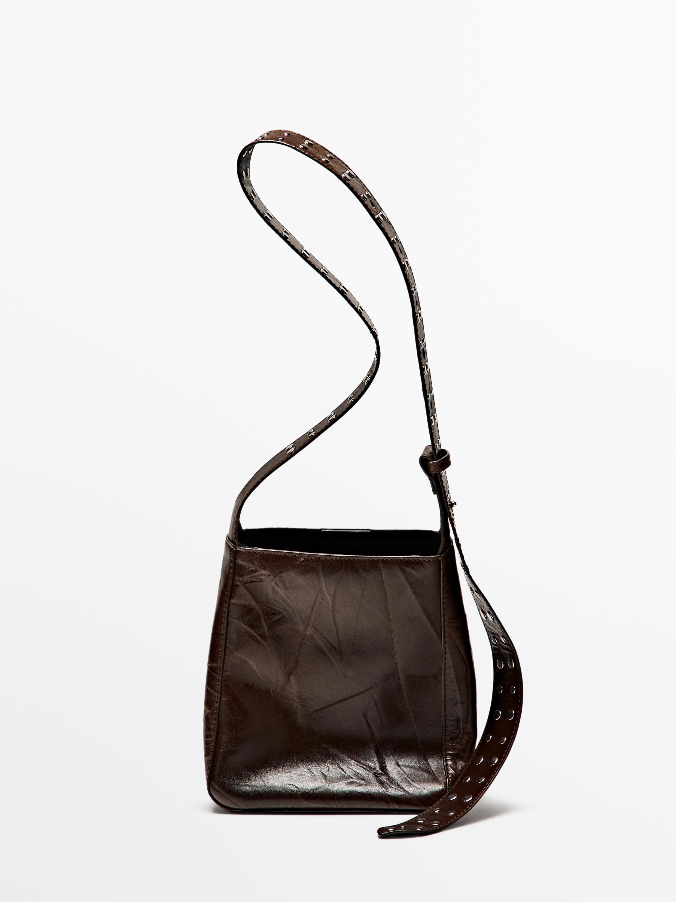 Nappa leather bucket bag with studs