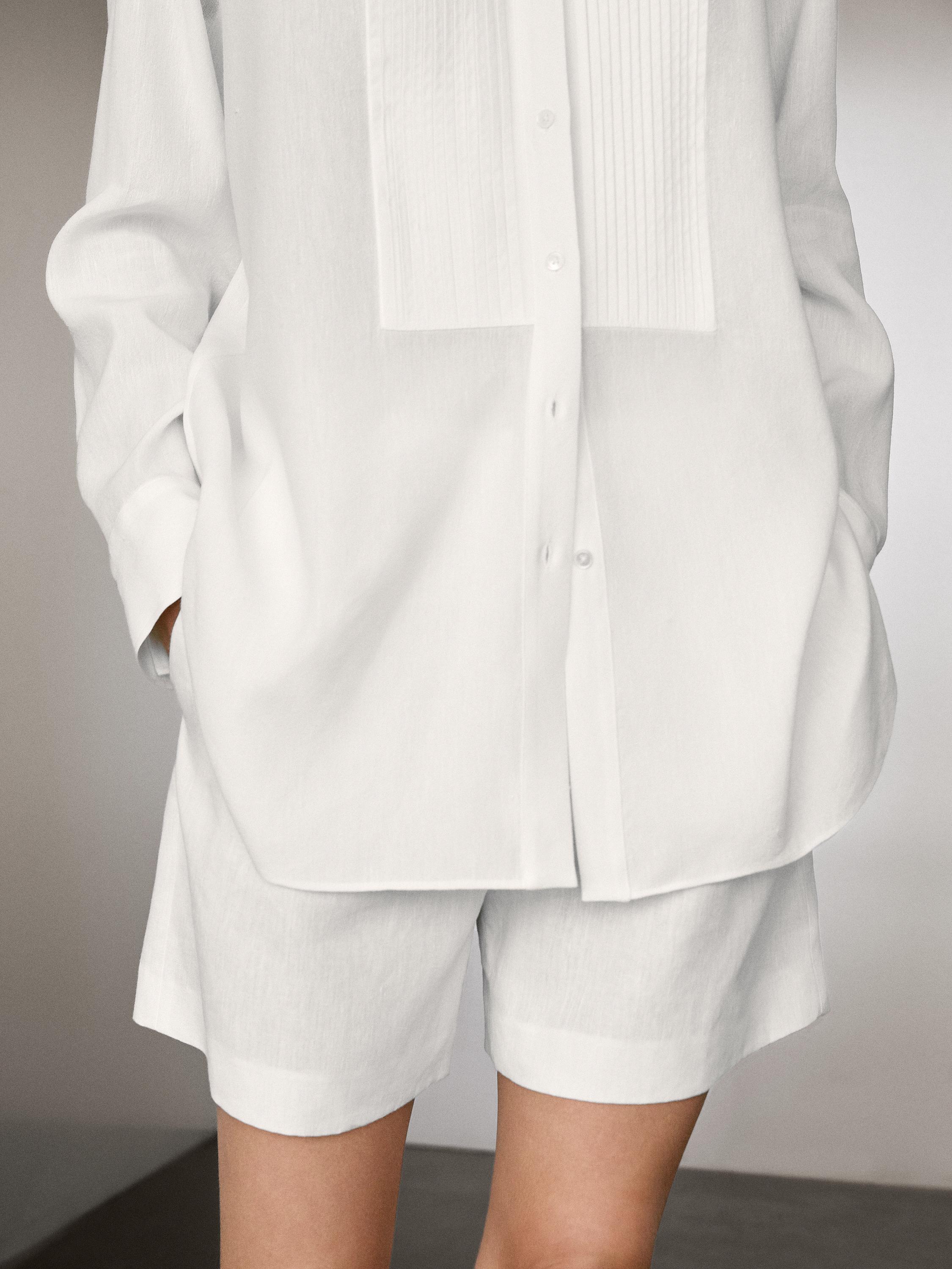 Chemisier lin à fins plis nervurés