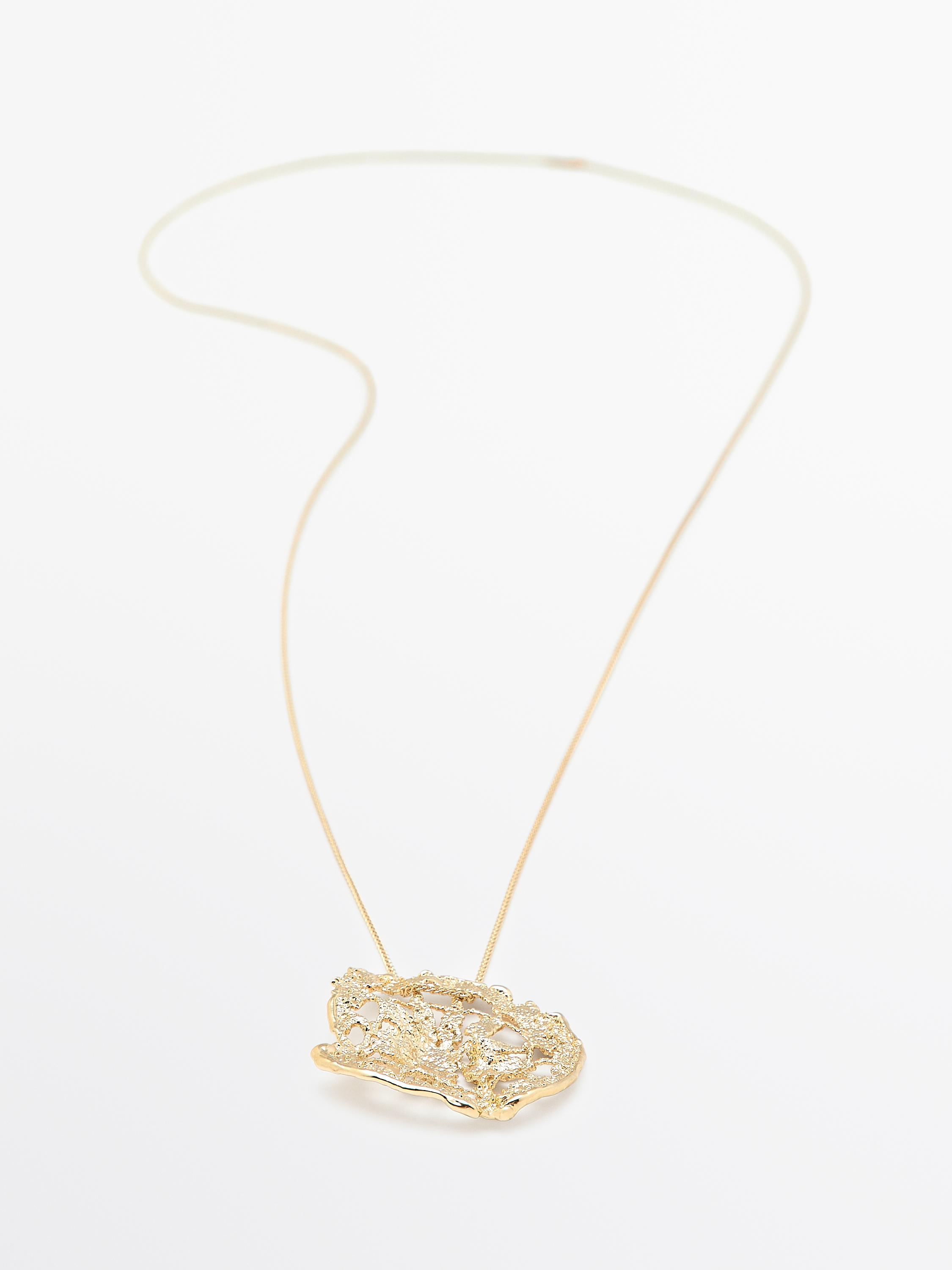 Necklace with lace piece pendant