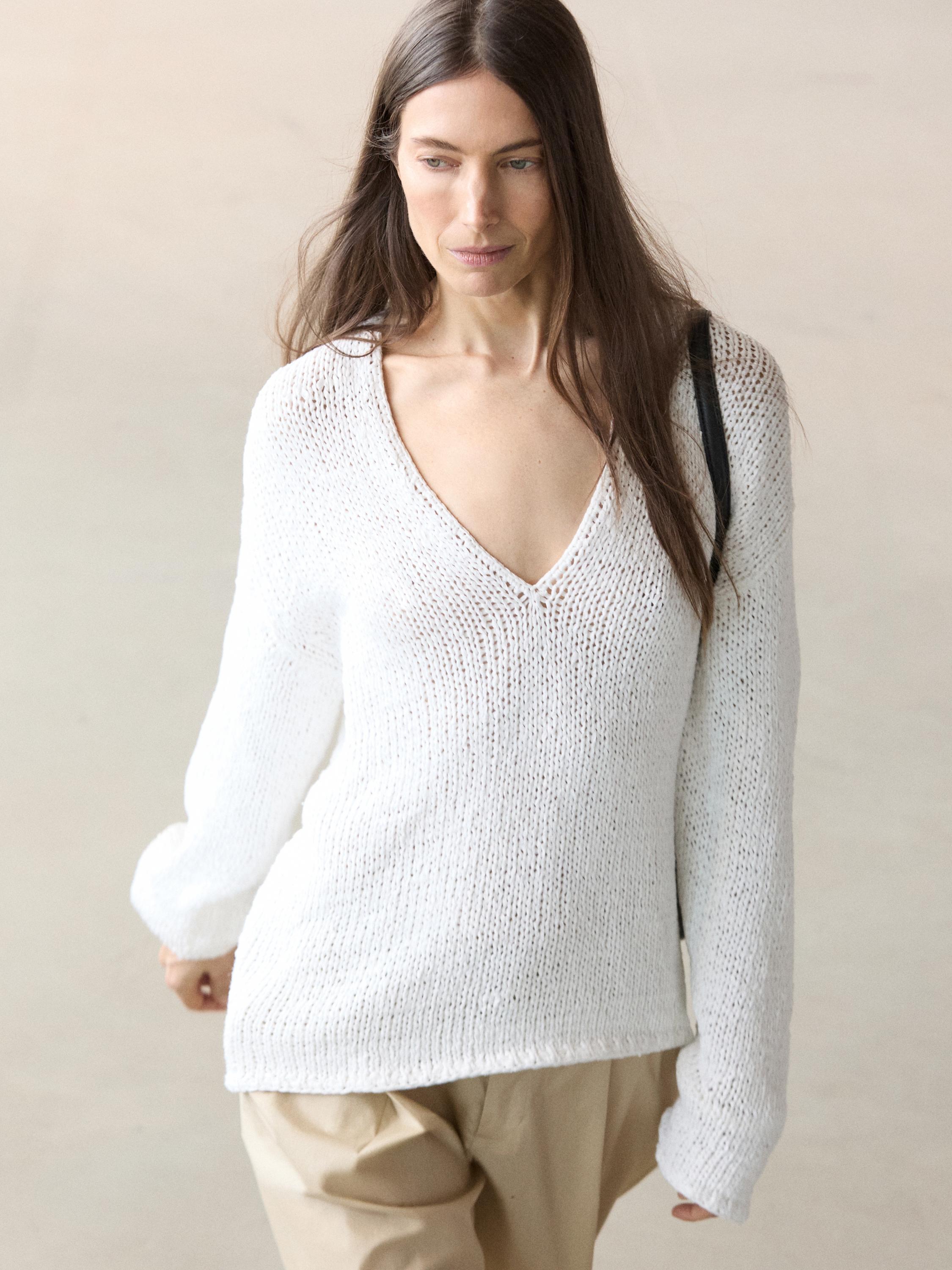 V-neck cutwork sweater