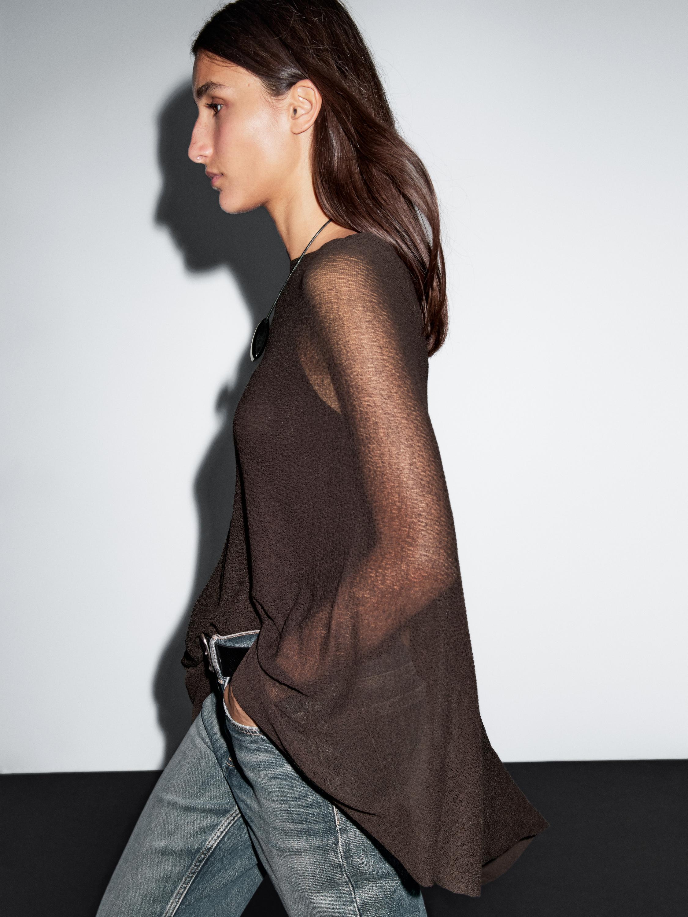Asymmetric knit cape