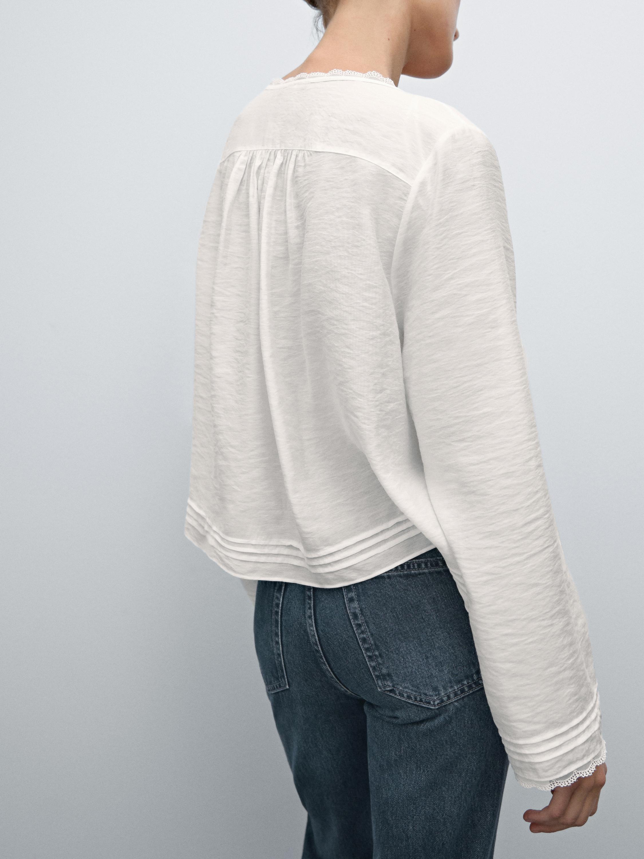 Flowing blouse with lace trim