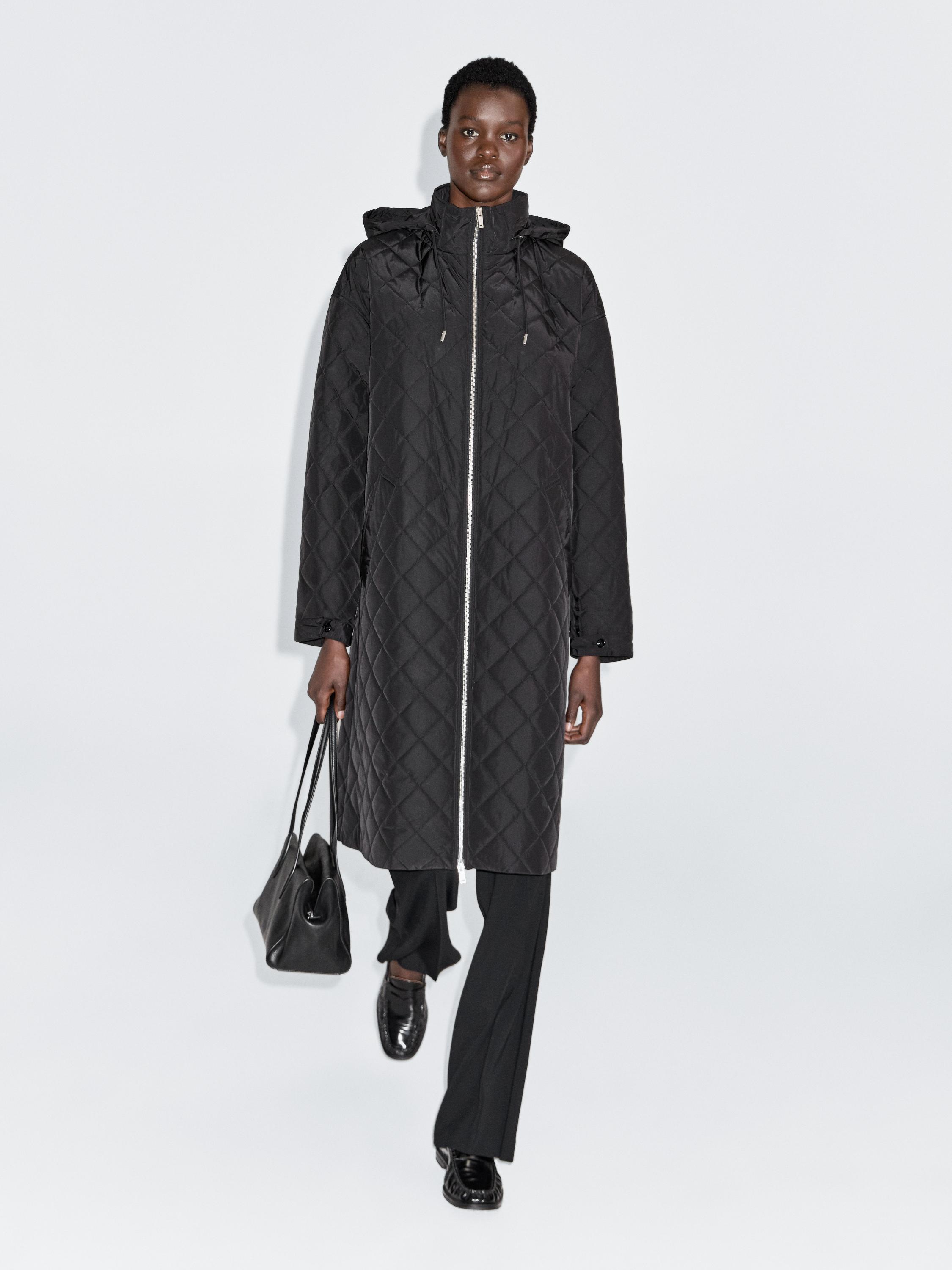 Long water-repellent oversize quilted parka