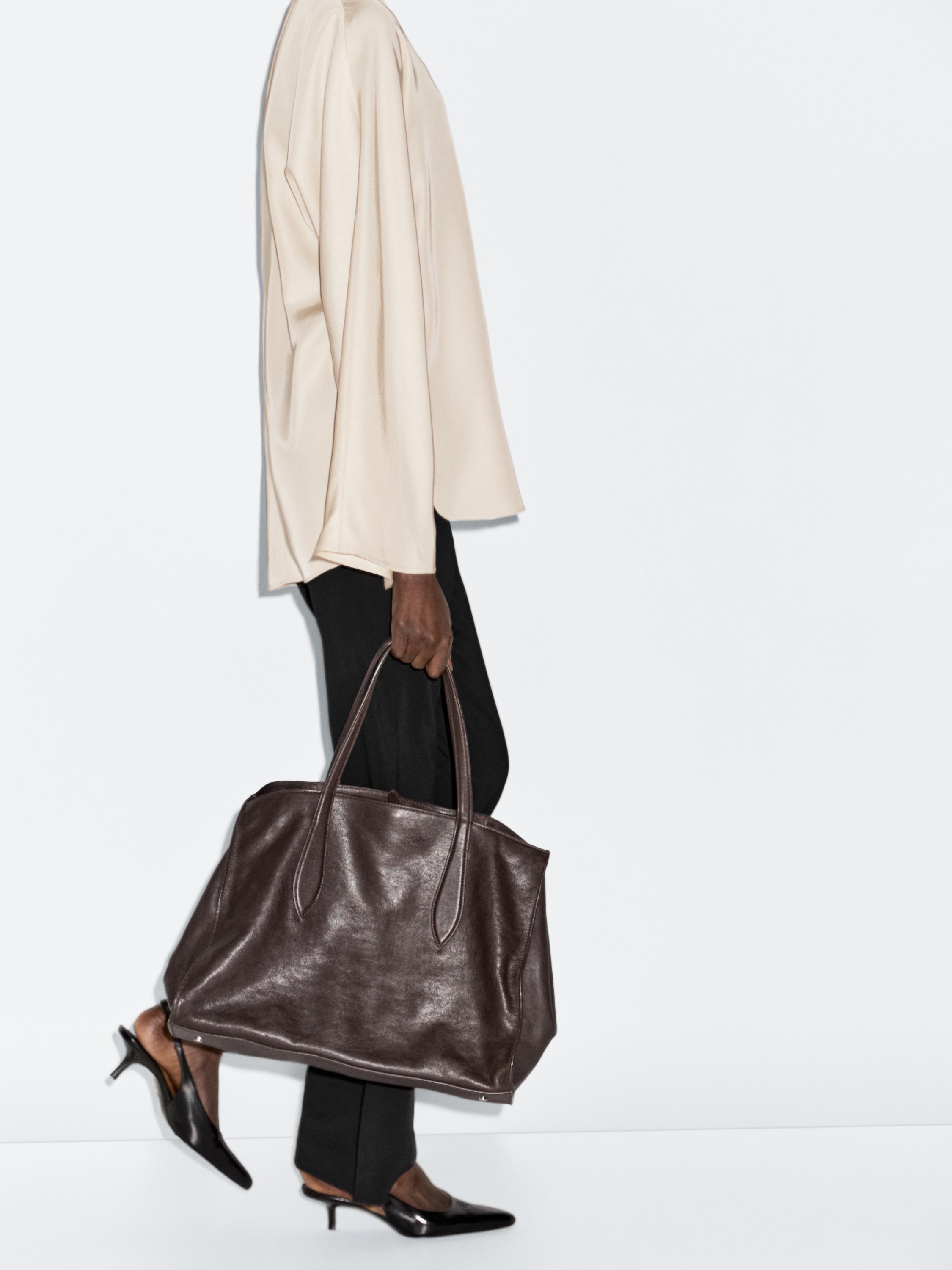 Flowing blouse with slit details