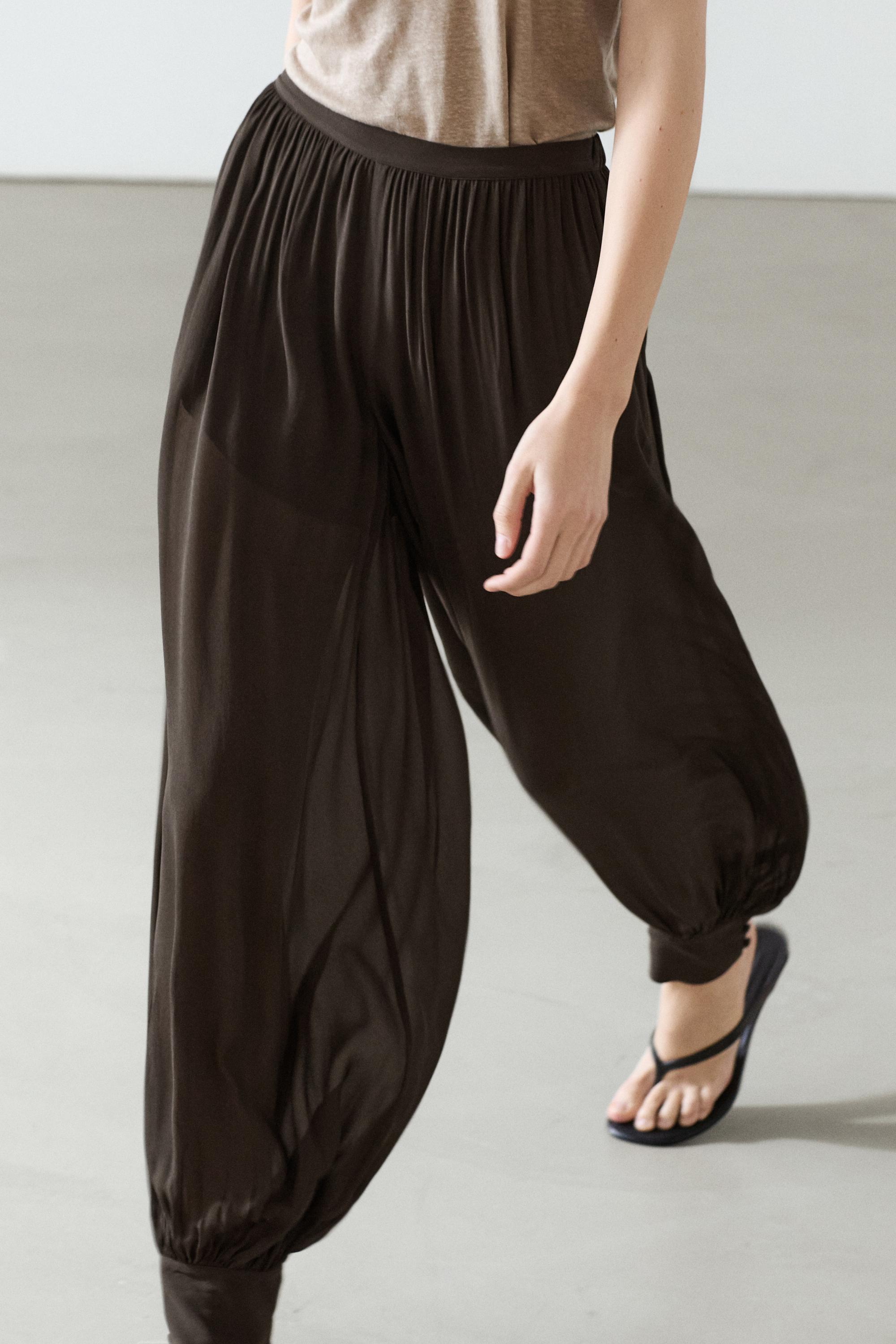 Semi-sheer sarouel trousers with button details — Chocolate