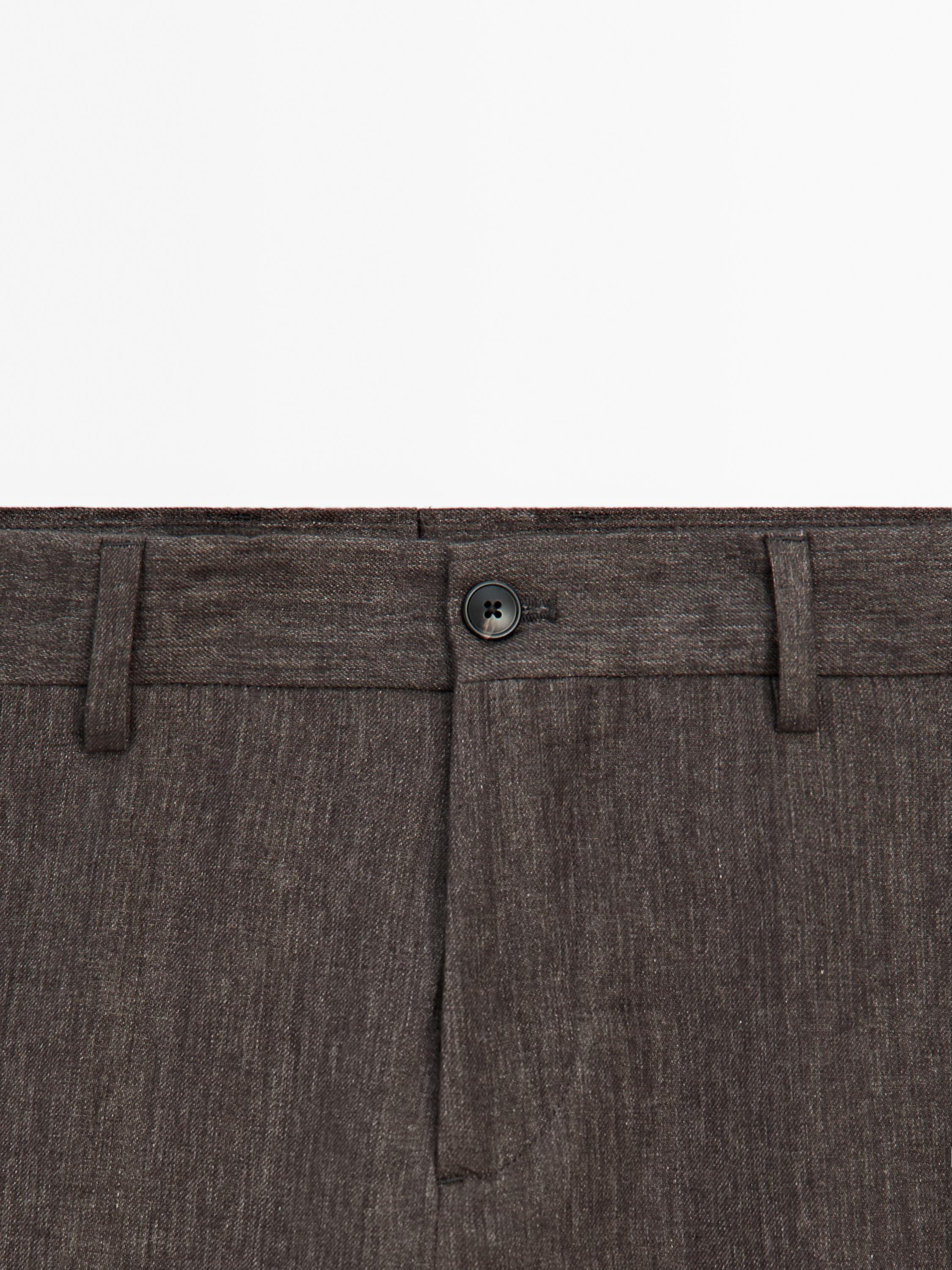 Faded total look linen trousers