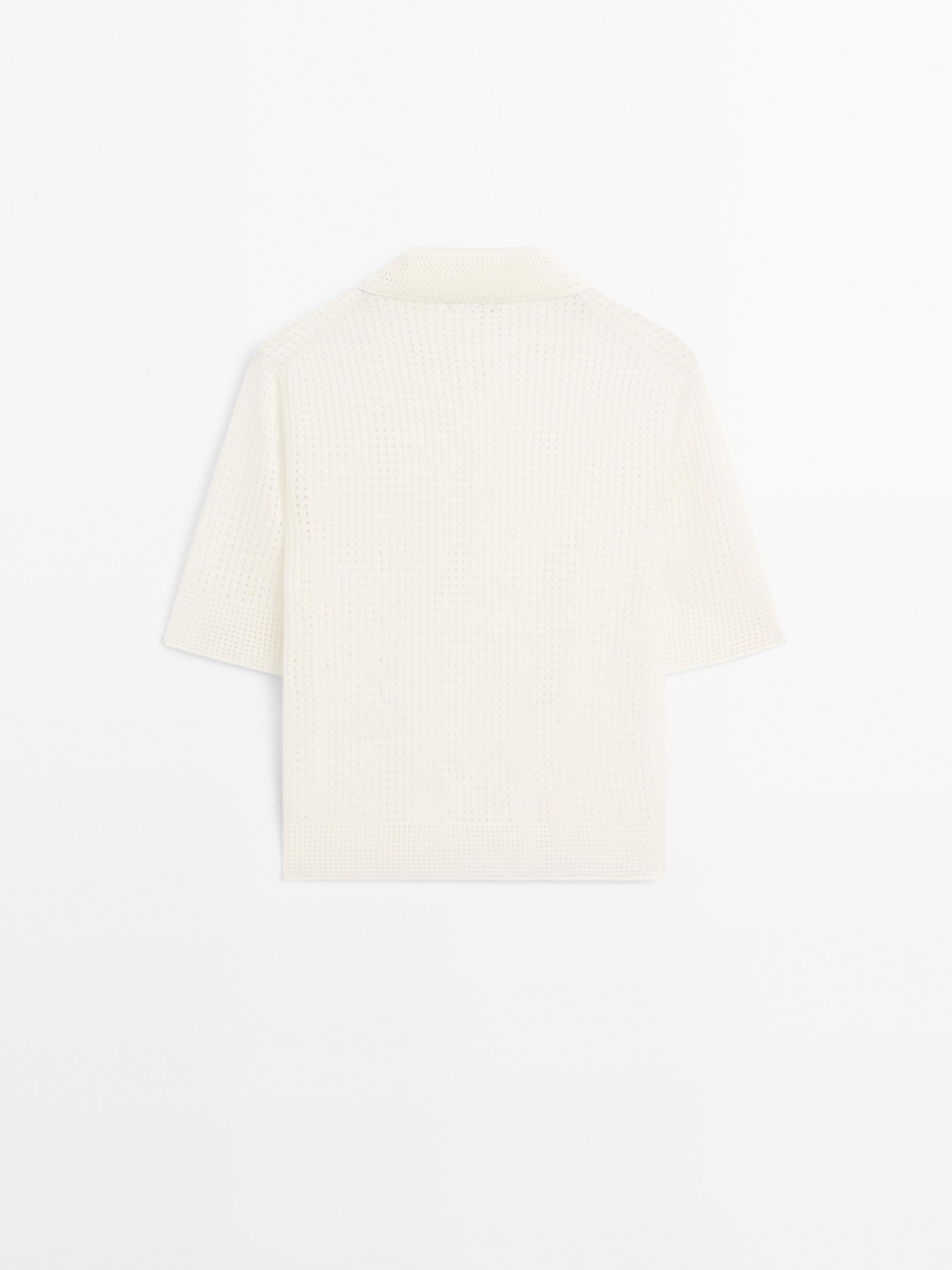 Open knit sweater with polo collar