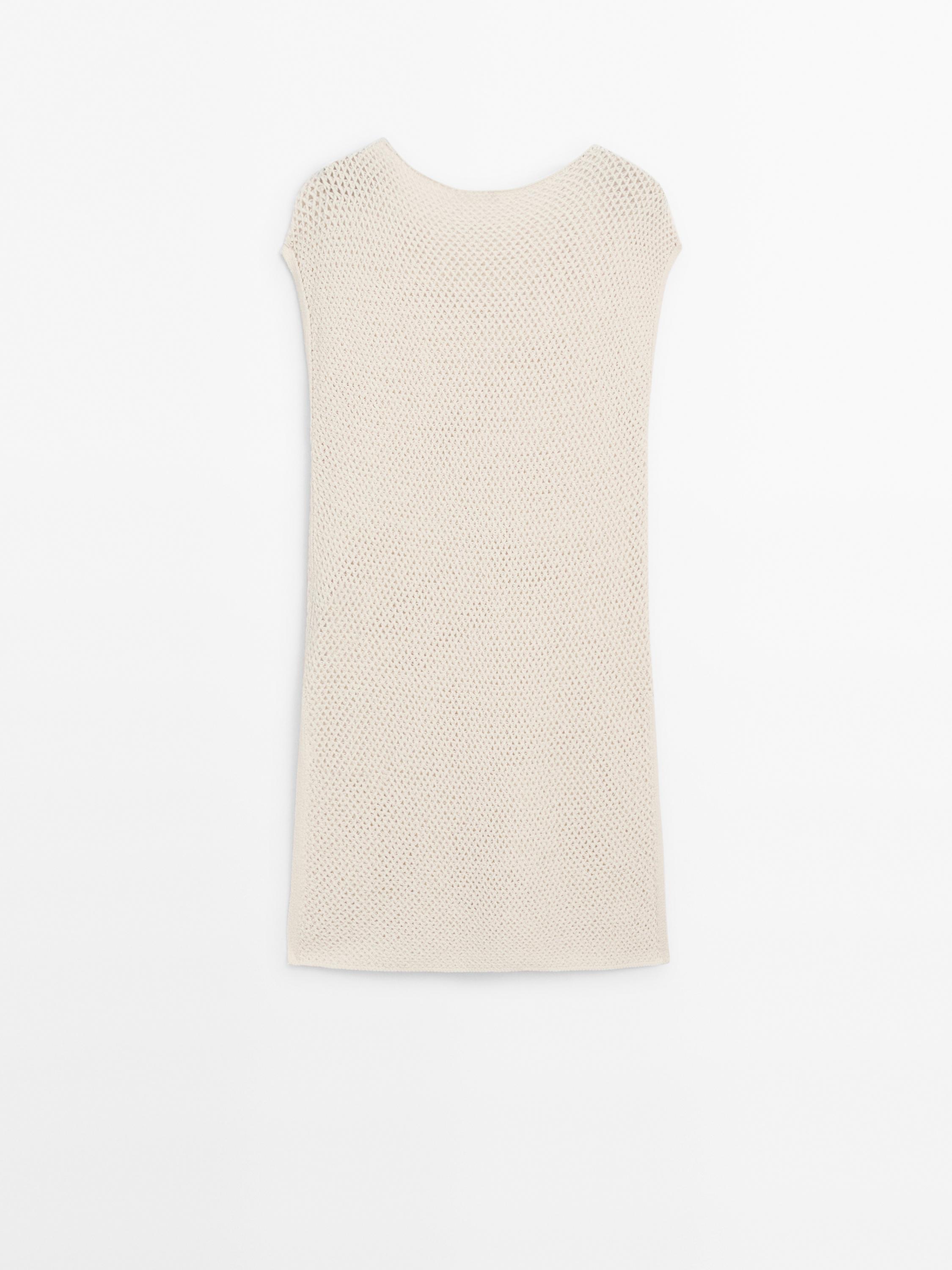 Knit vest with vent details