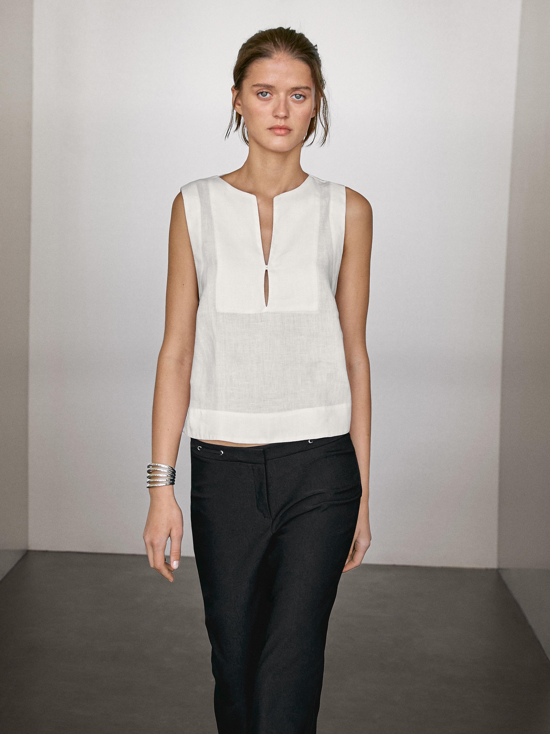 بلوزة كتان 100% مفصلة بدرزات