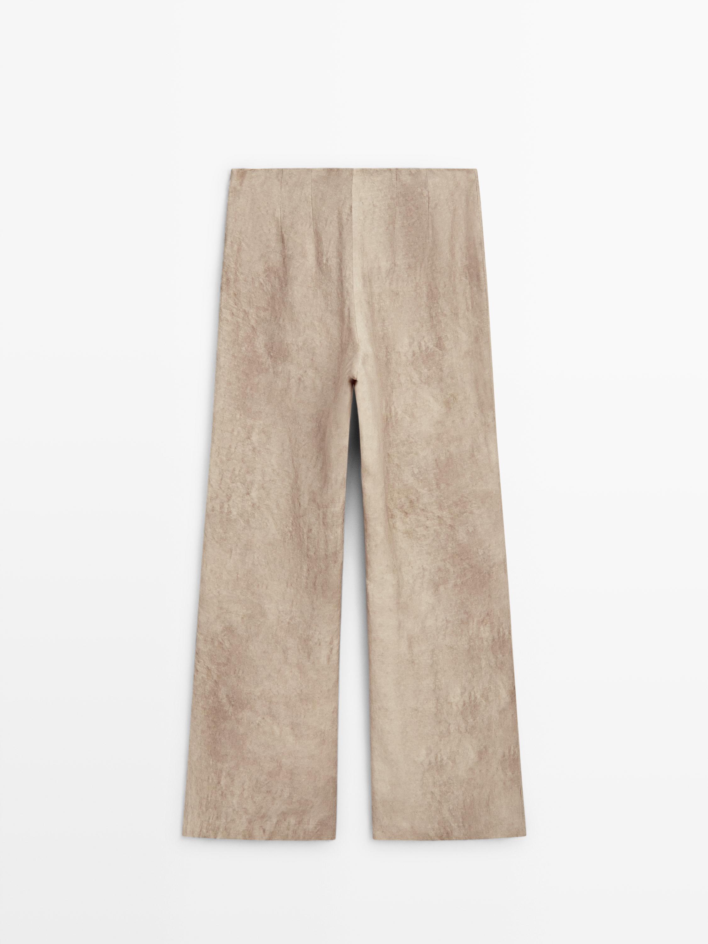 Distressed-effect flowing trousers — STONE