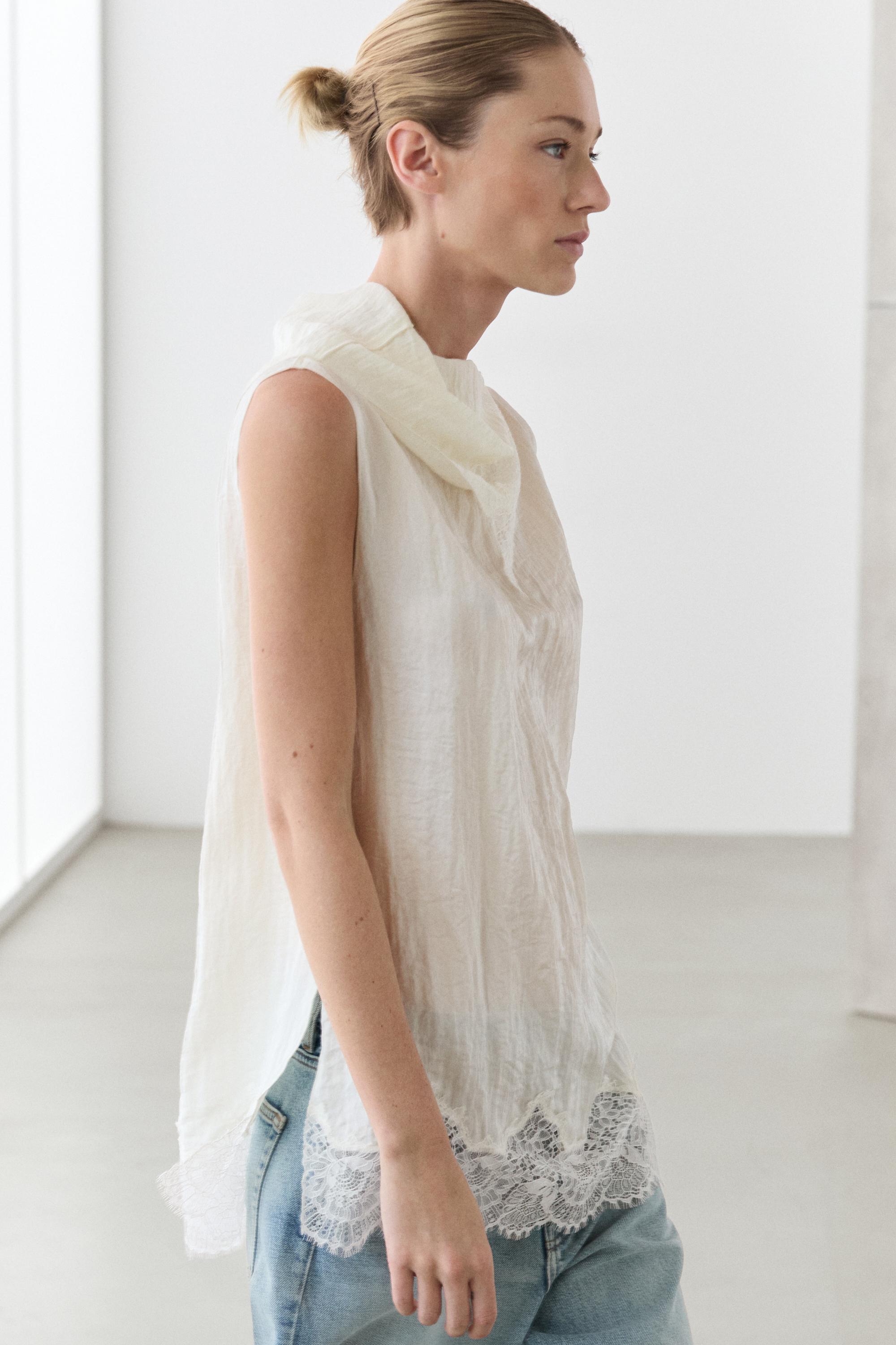 Asymmetric roll neck top with lace detail — CREAM