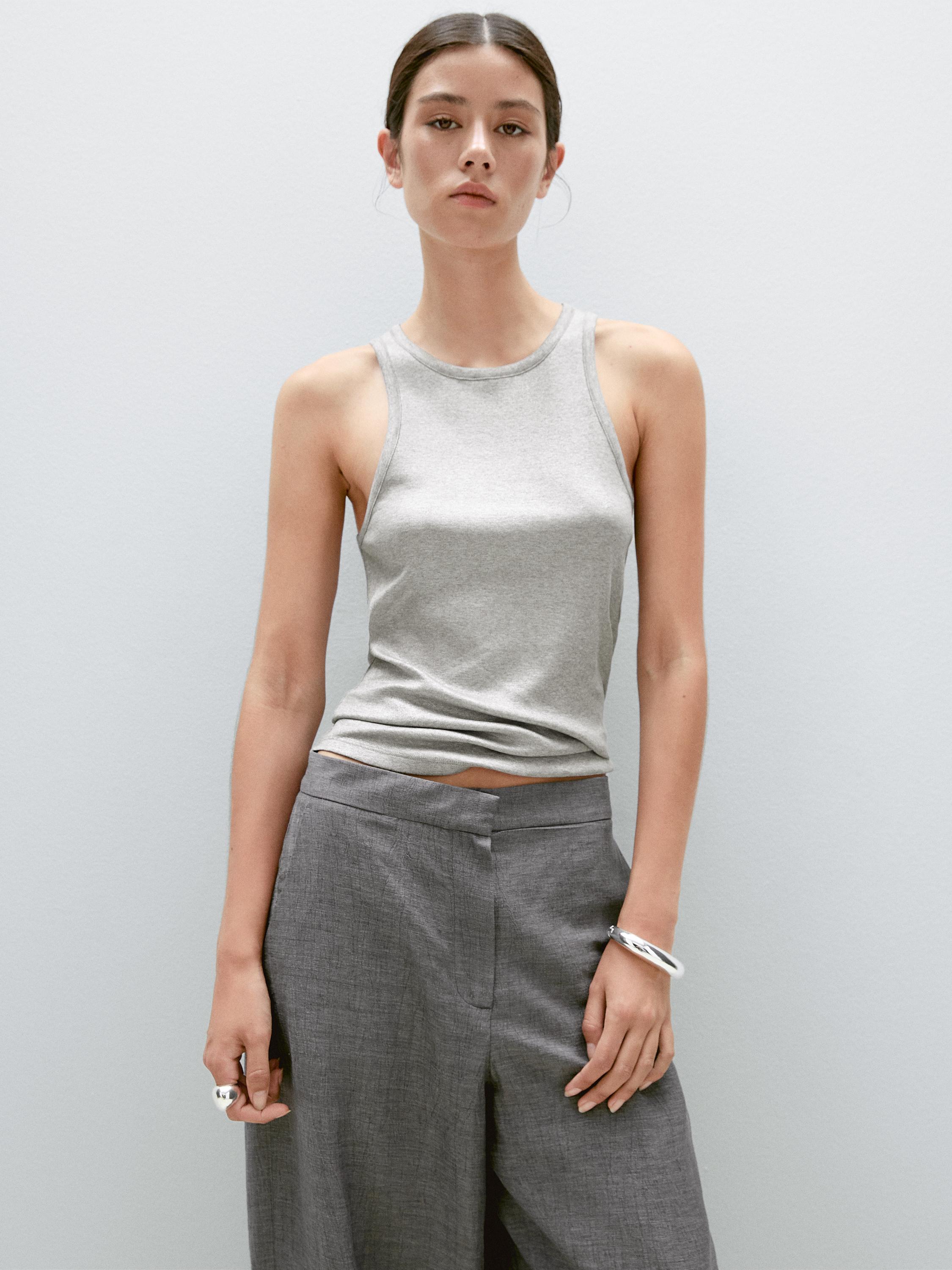 Top cuello redondo detalle brillo