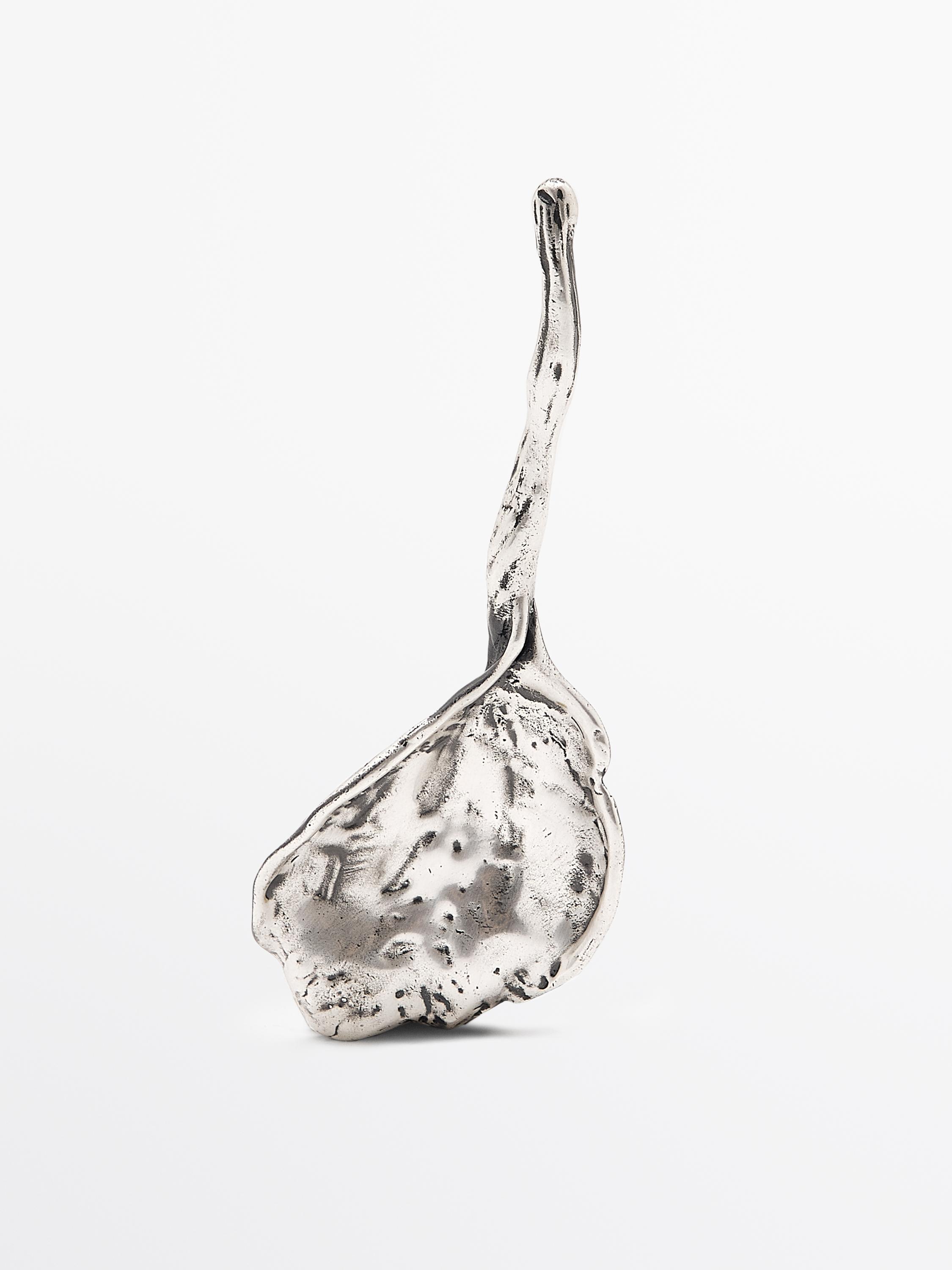 Abstrakte Metallbrosche