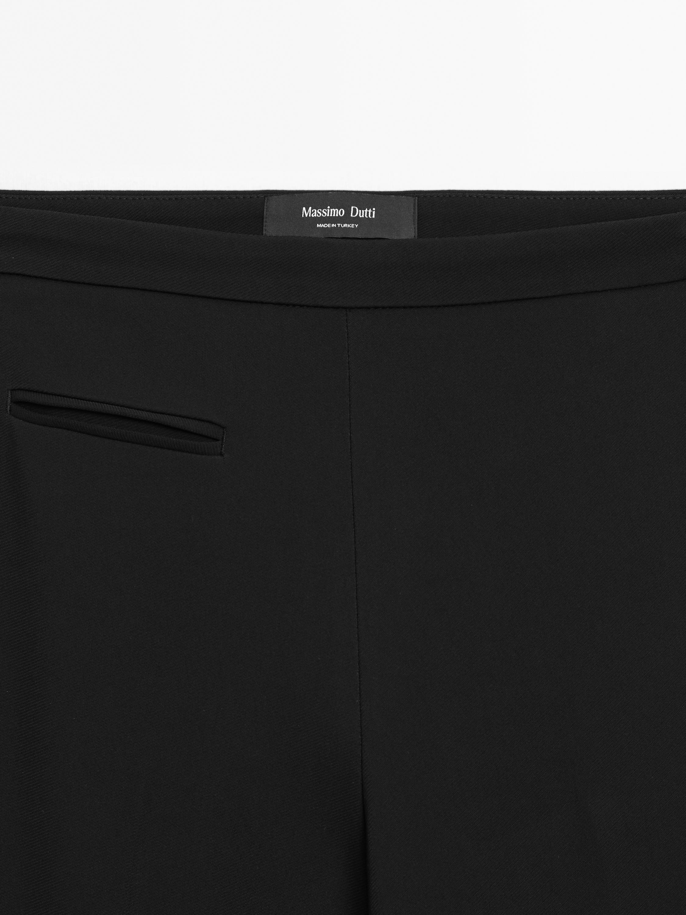 Flared trousers with pocket
