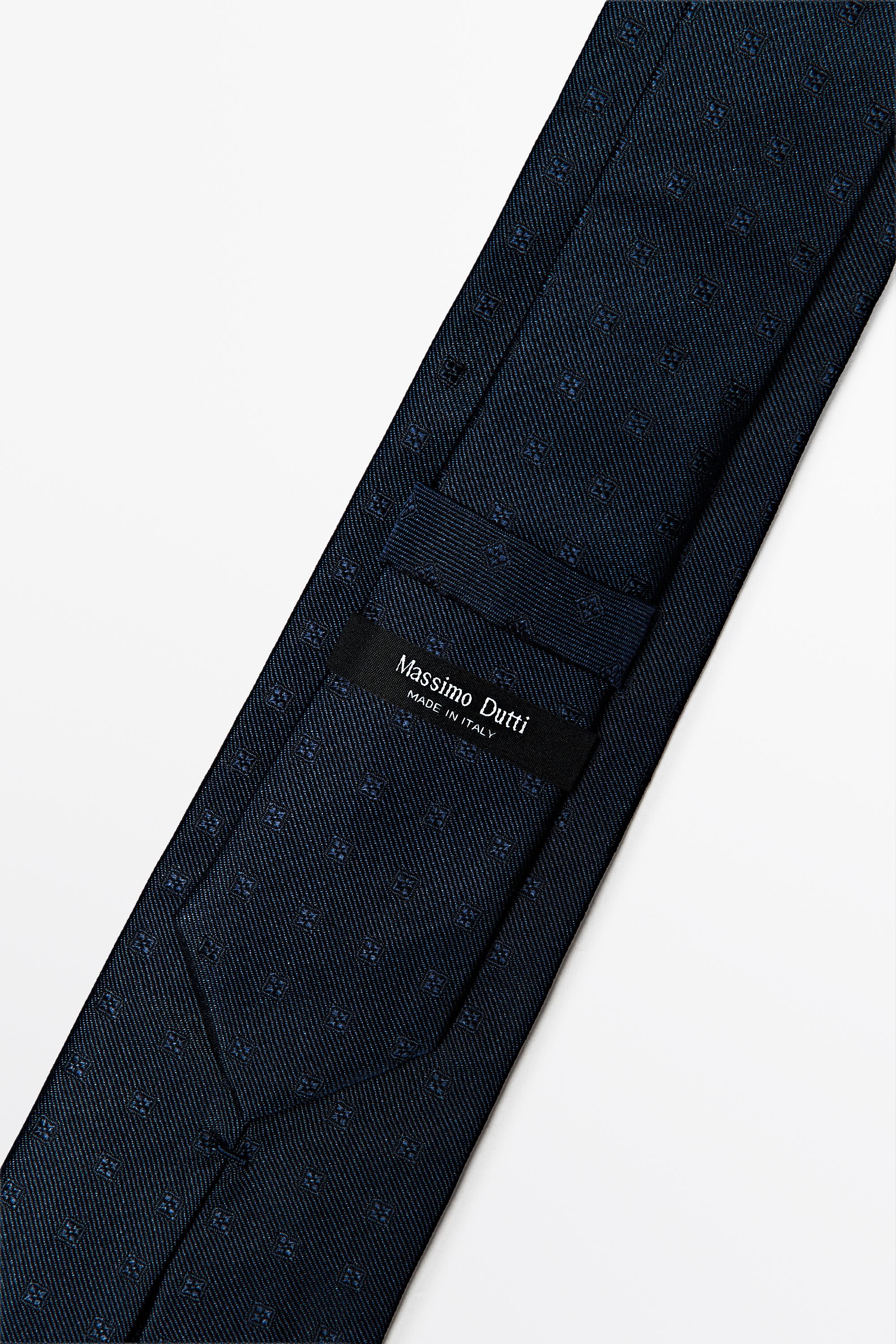 100% silk tie with embroidered detail — NAVY BLUE
