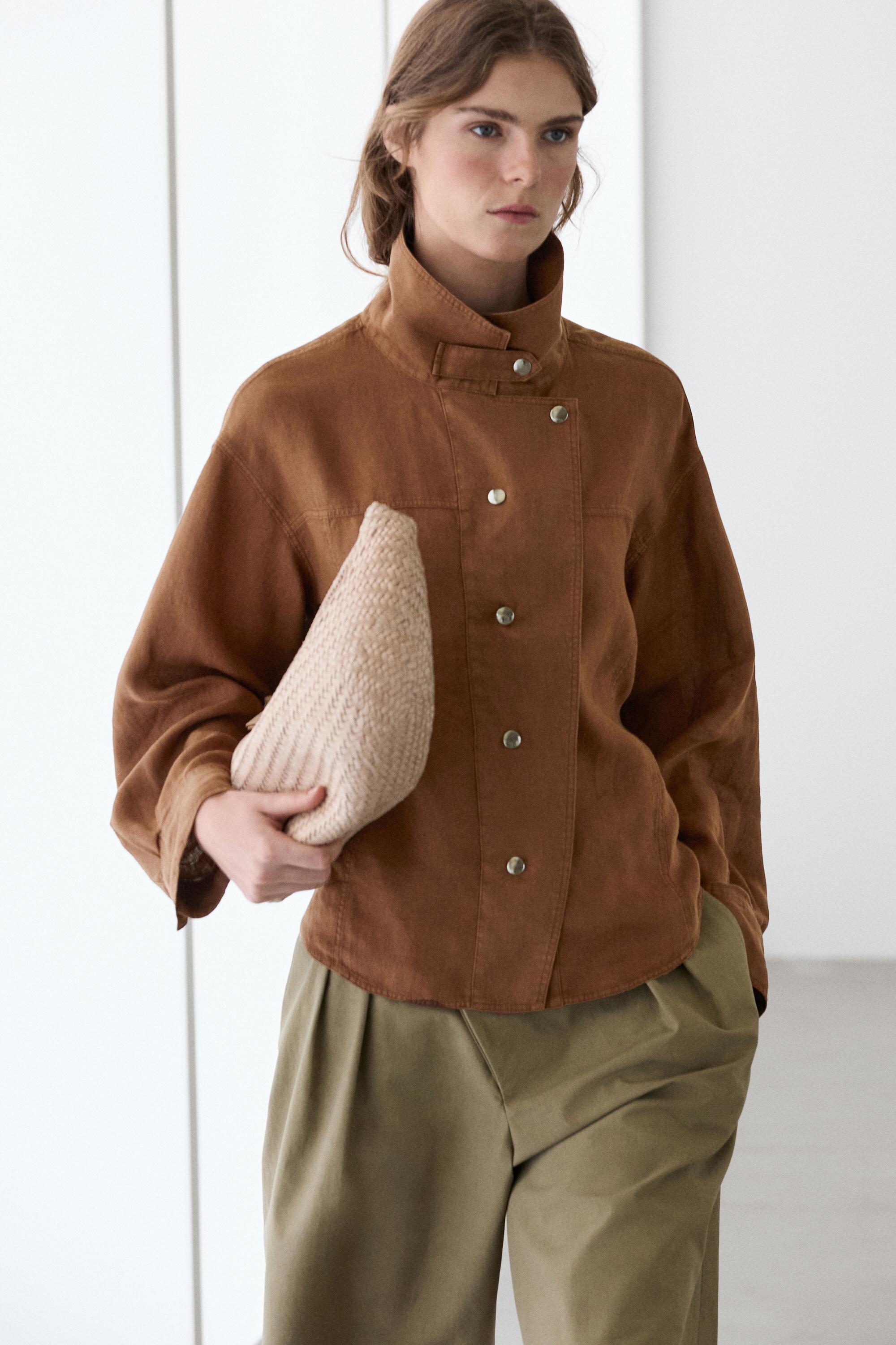Braided leather half-moon bag — CREAM