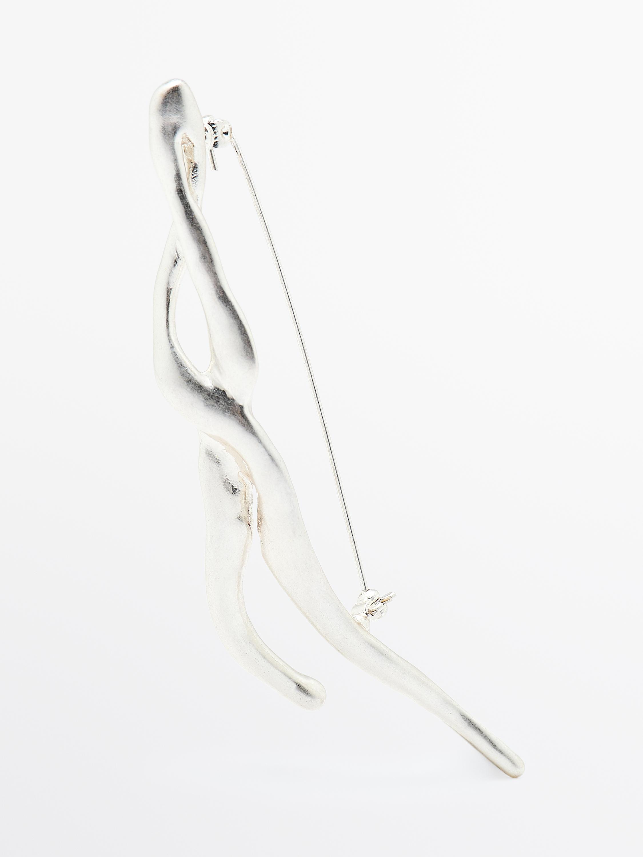 Abstract metal brooch