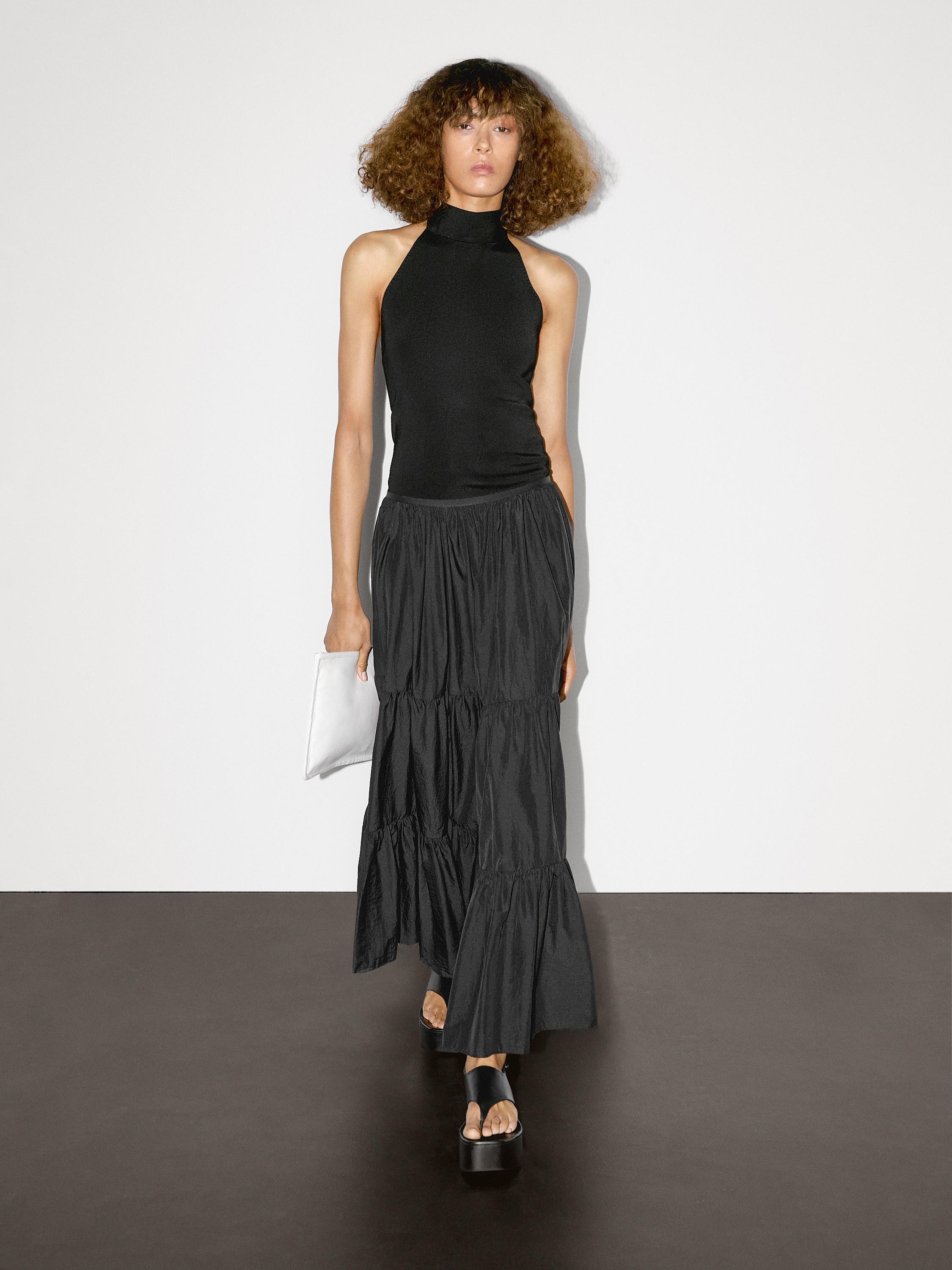 Falda larga evasé detalle frunces