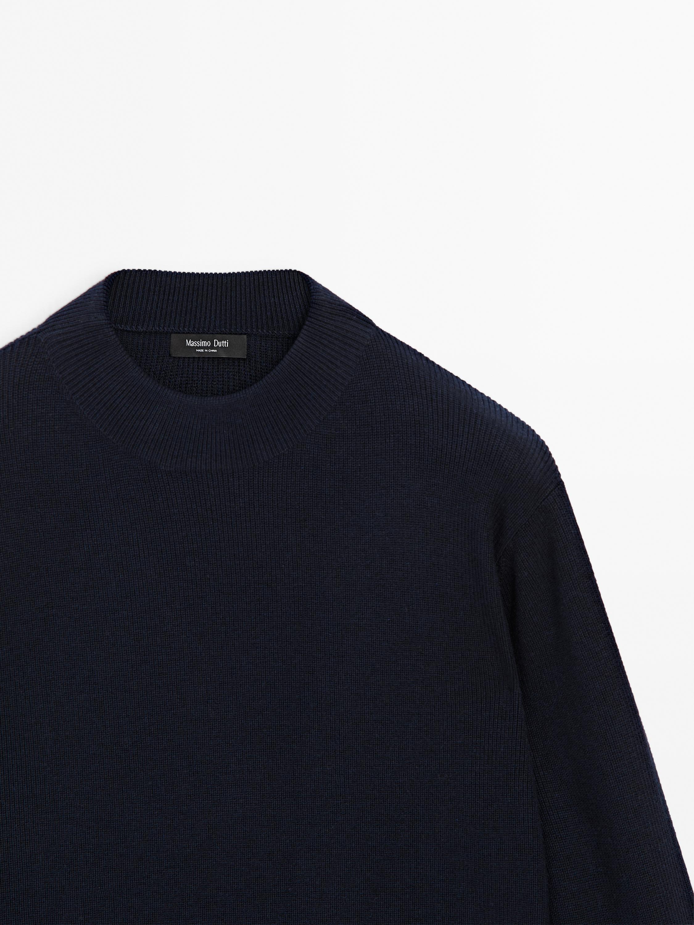 Pull en maille à col montant