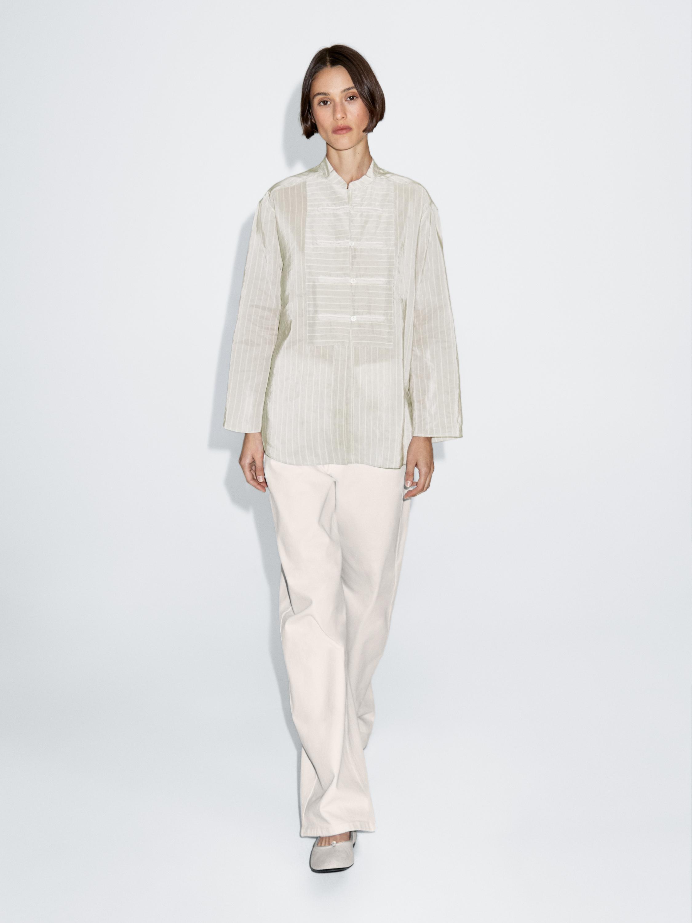 Striped oversize blouse with stand collar