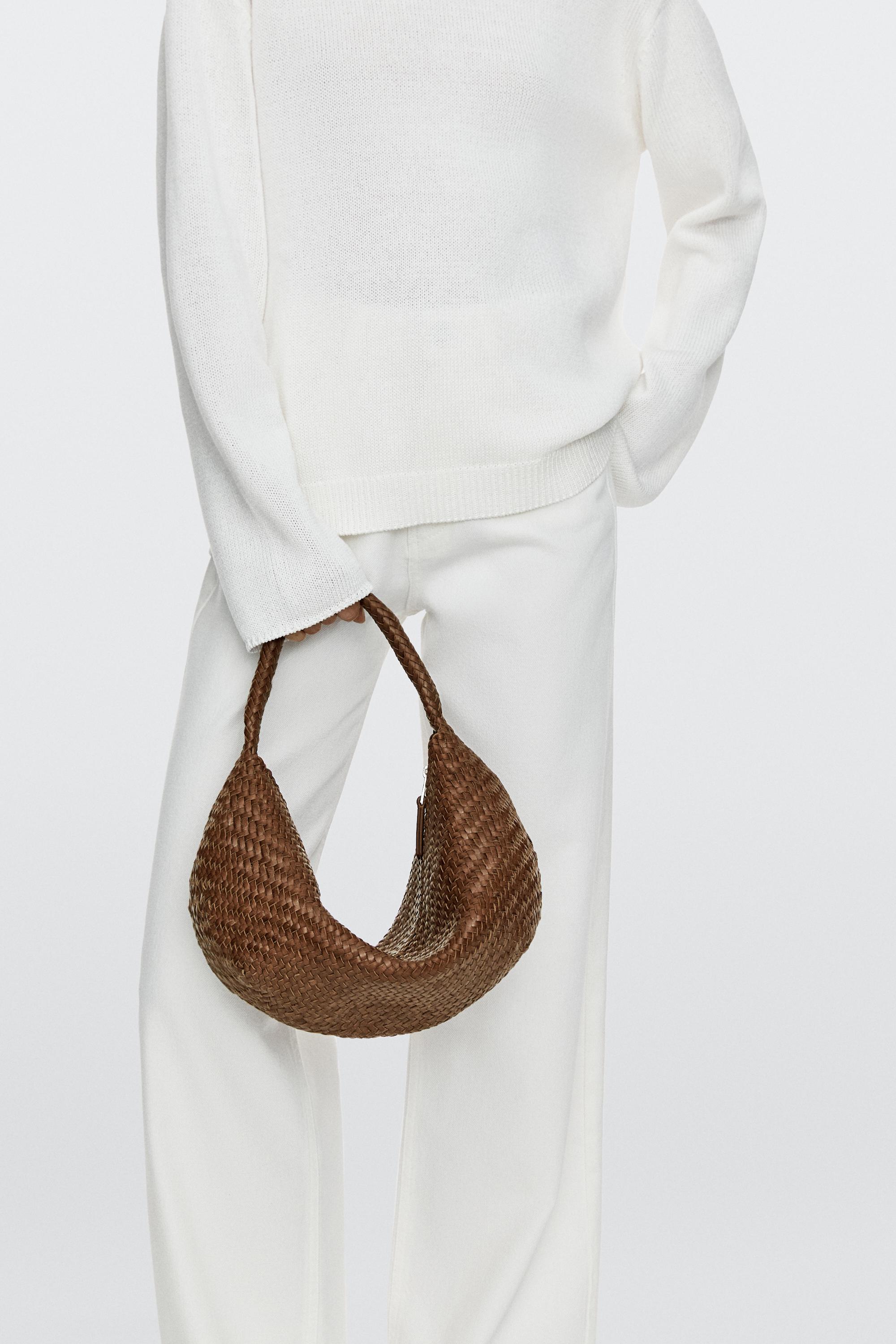 Braided leather half-moon bag