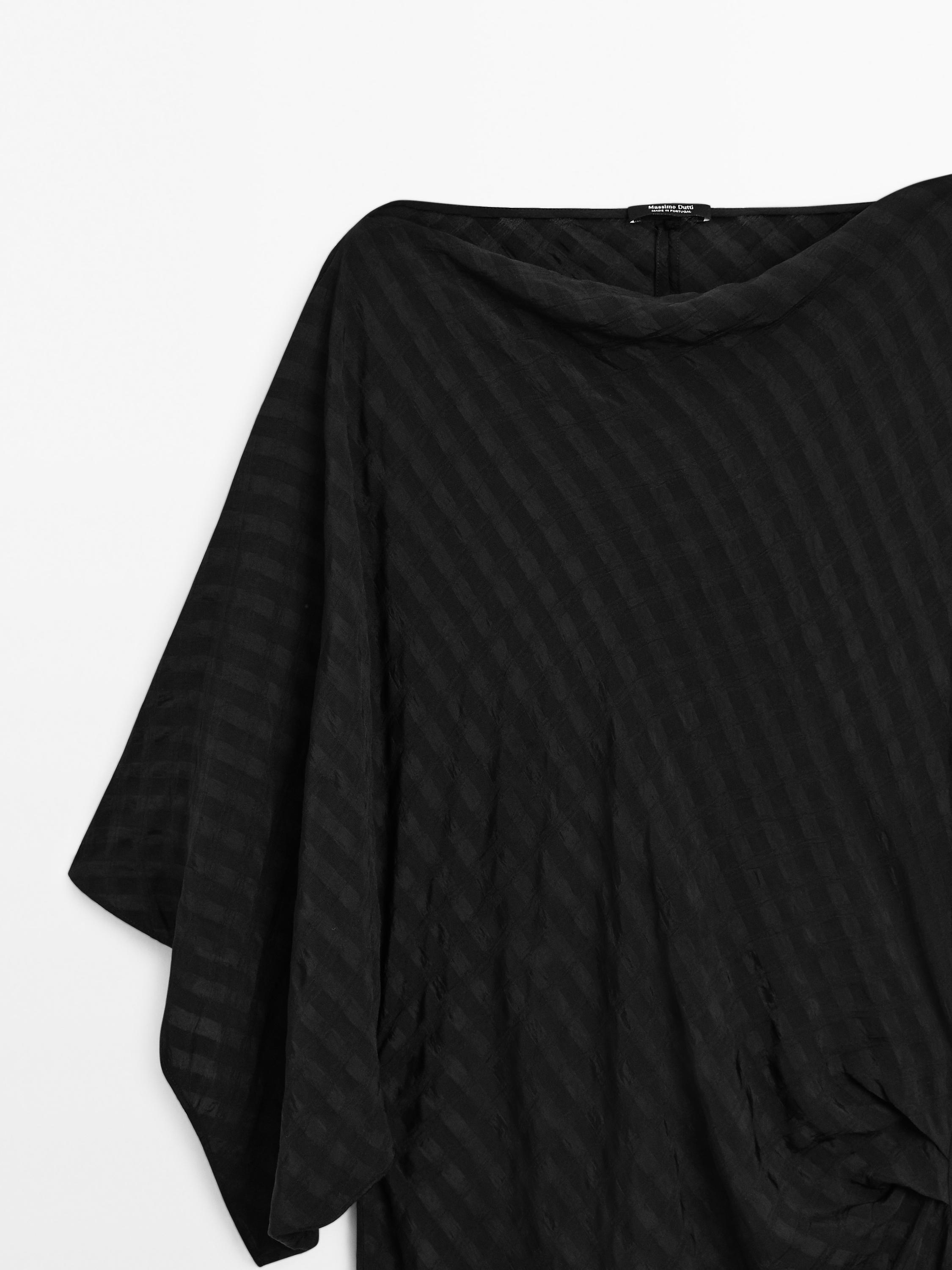Long flowing dress with textured detail