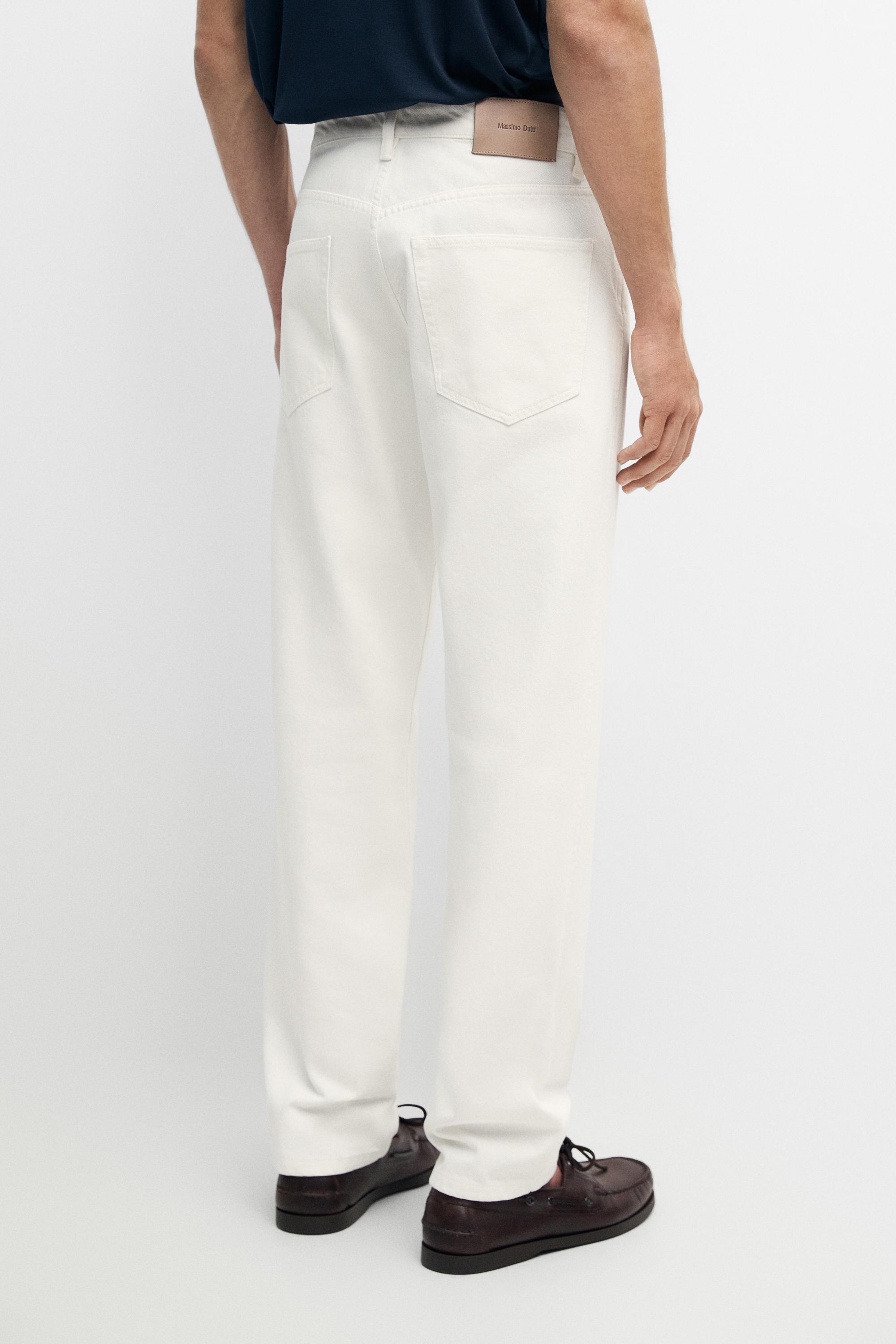 Tapered Fit Jeans — CREAM