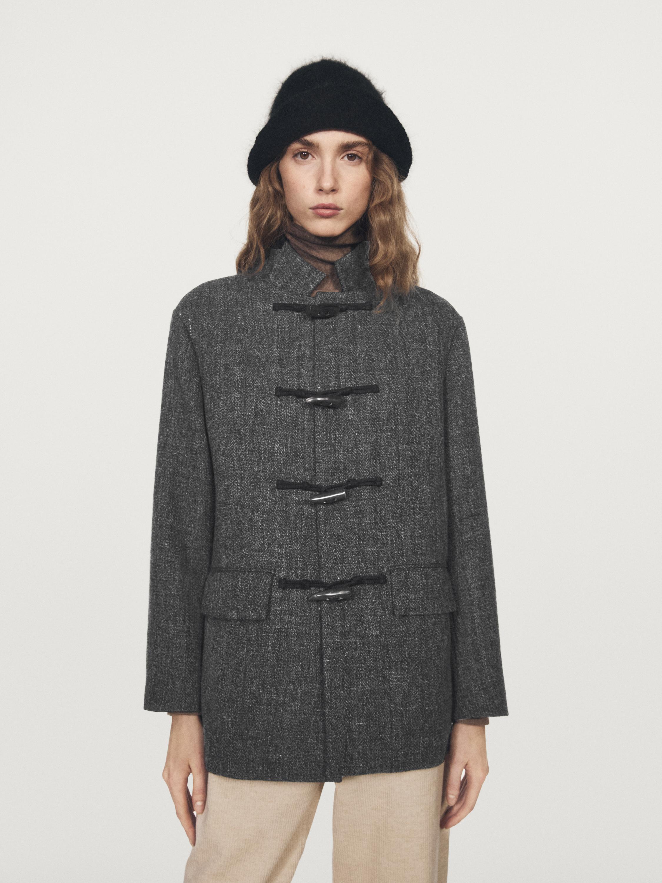 Mid-length coat with horn toggle