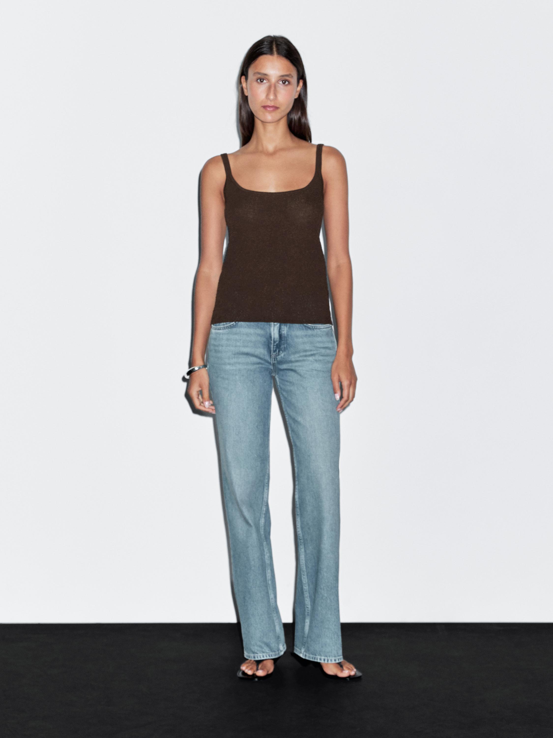 Flowing knit top with straps