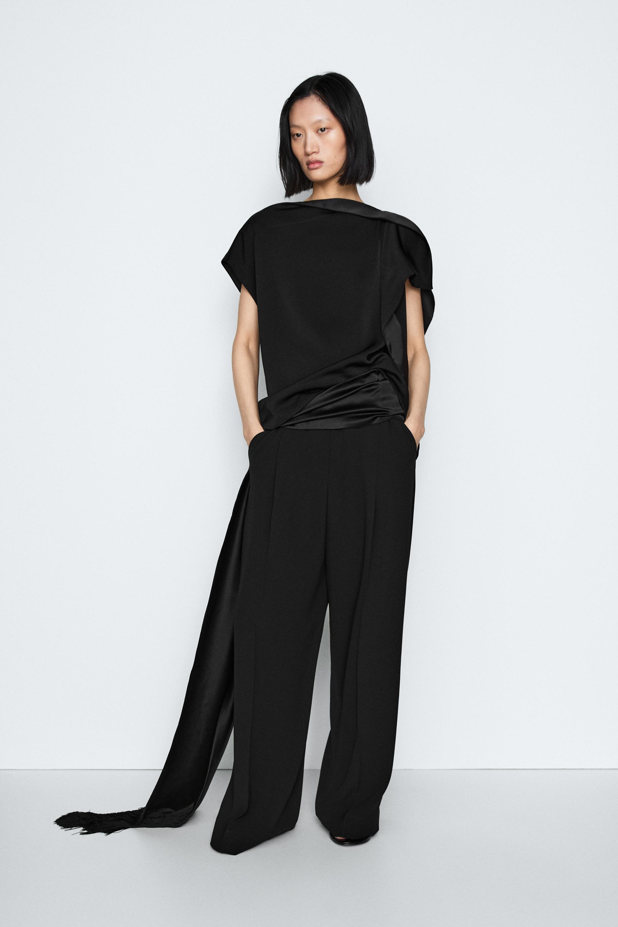 Top asimmetrico con volant - STUDIO