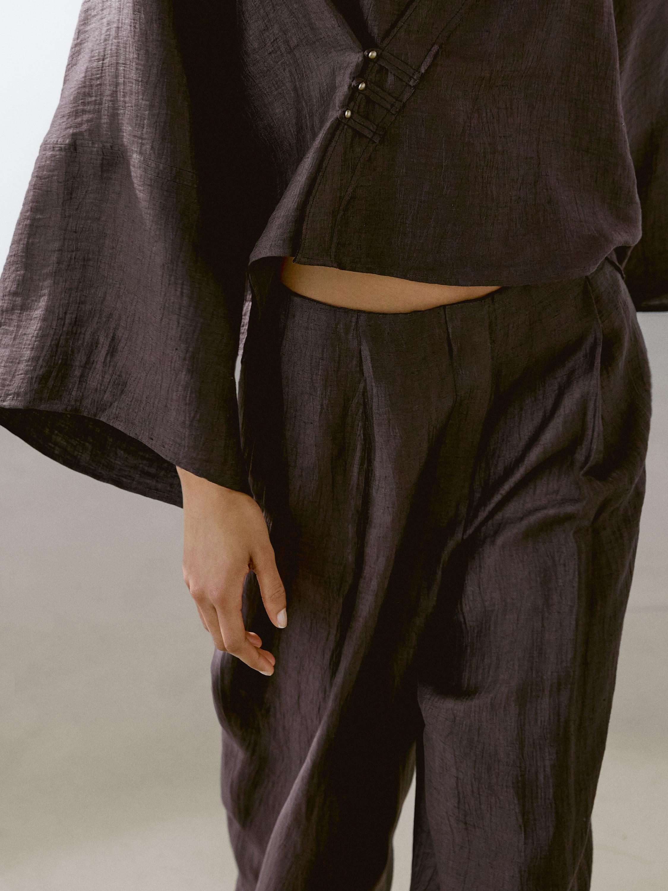 Flowing linen blend trousers with darts