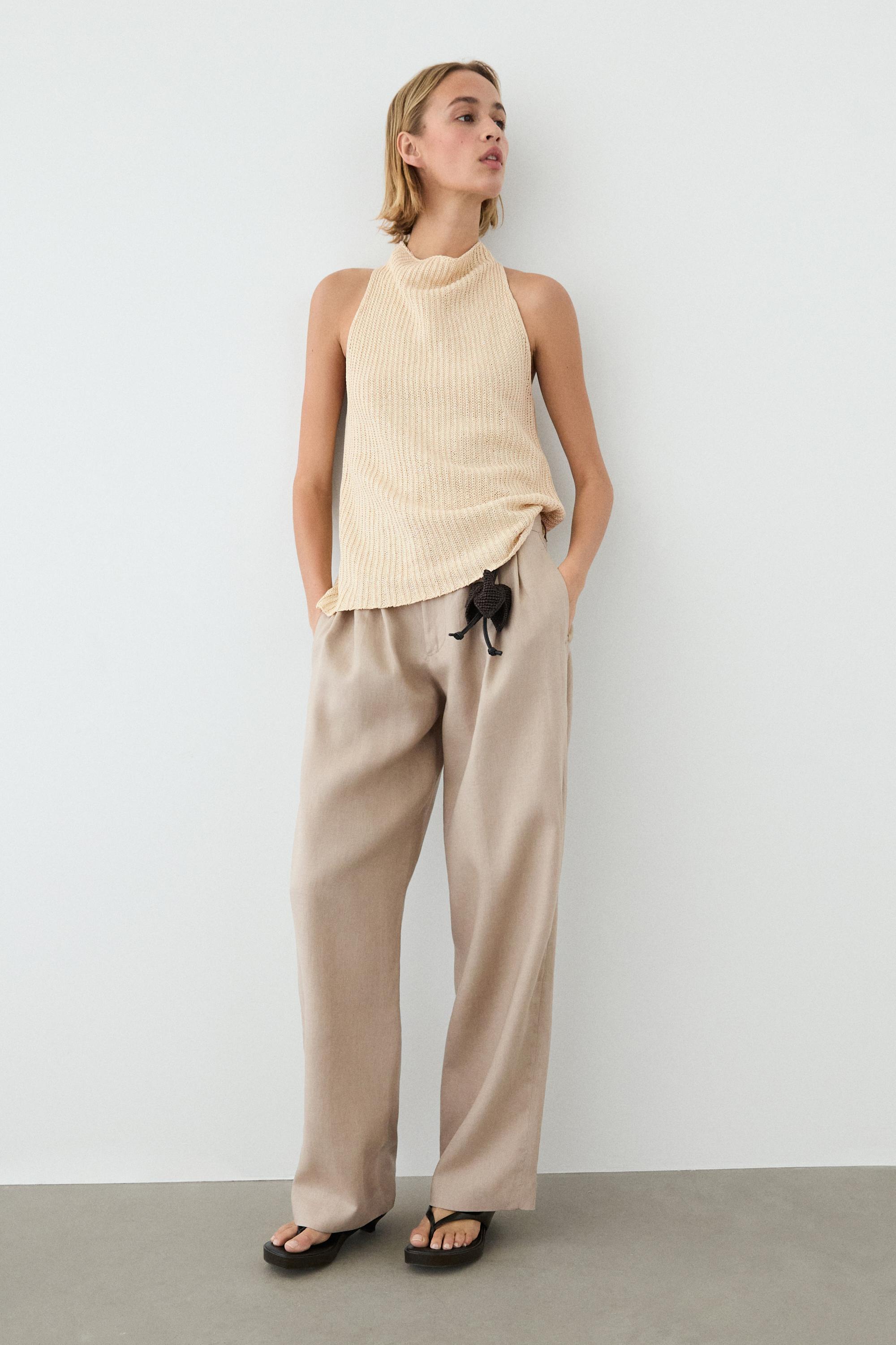 Wide-leg pleated linen trousers — STONE
