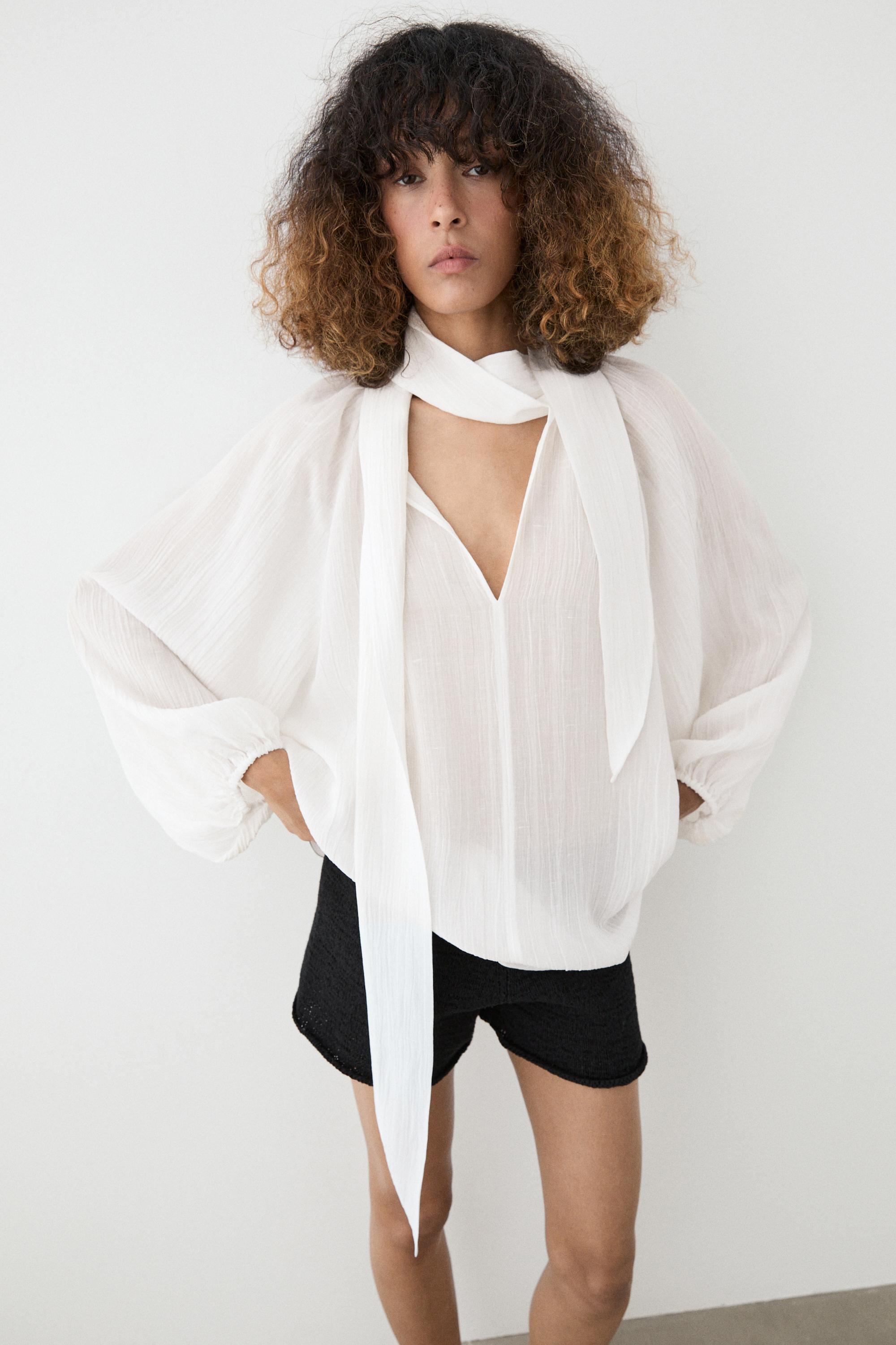 Flowing V-neck blouse with tie — WHITE