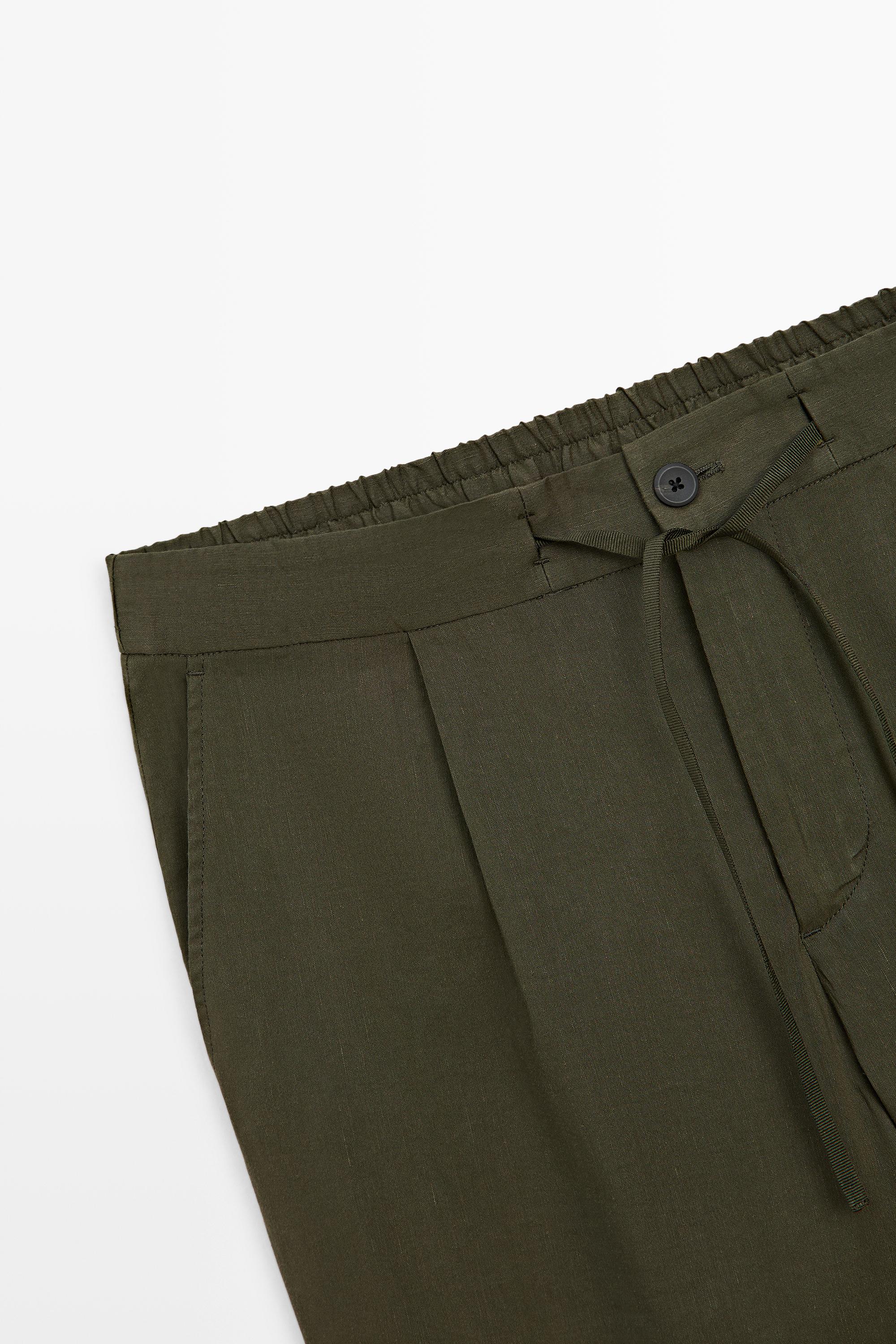Total look darted jogger fit trousers — GREEN