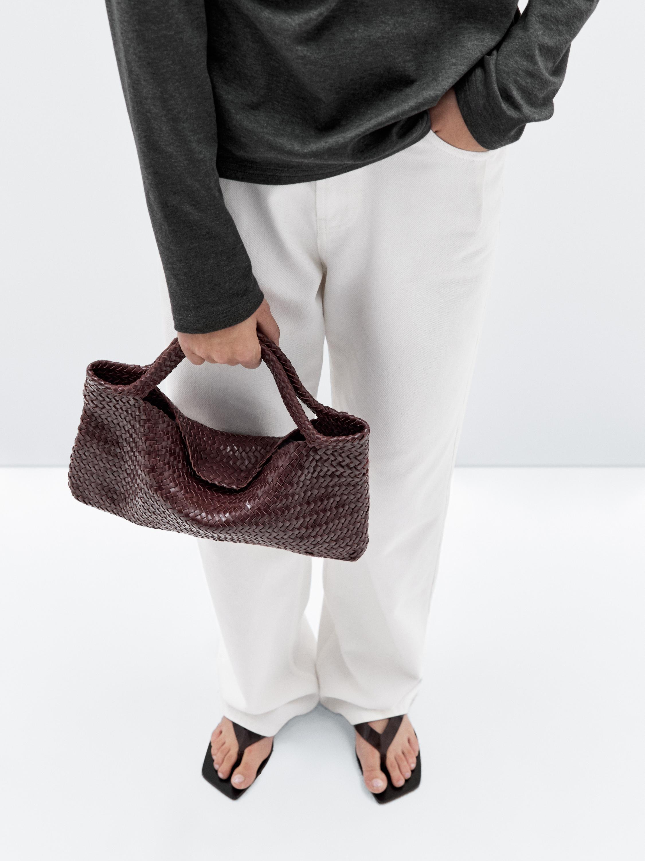 Srednje velika pletena torba od napa kože