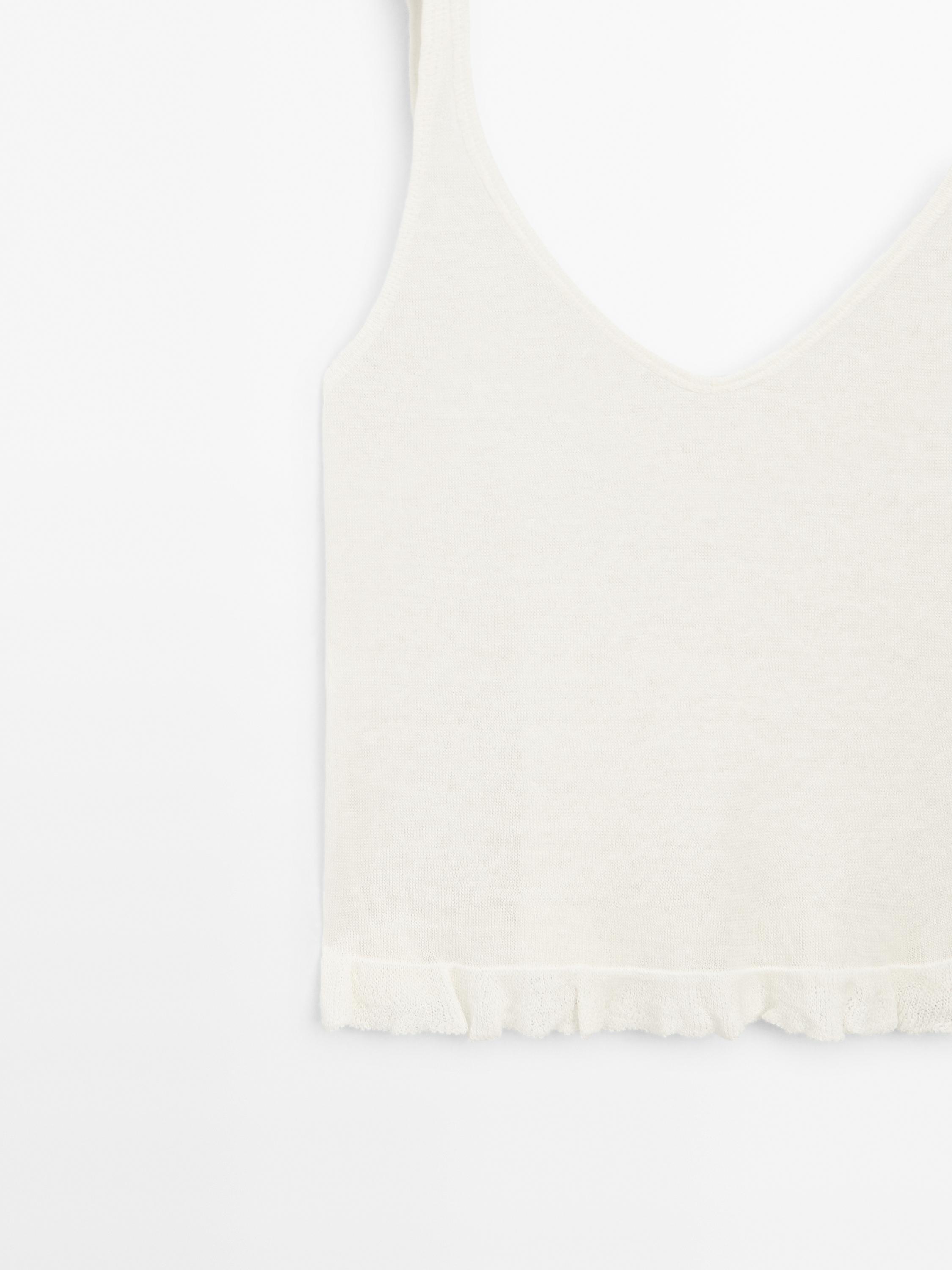 100% linen top with ruffled hem