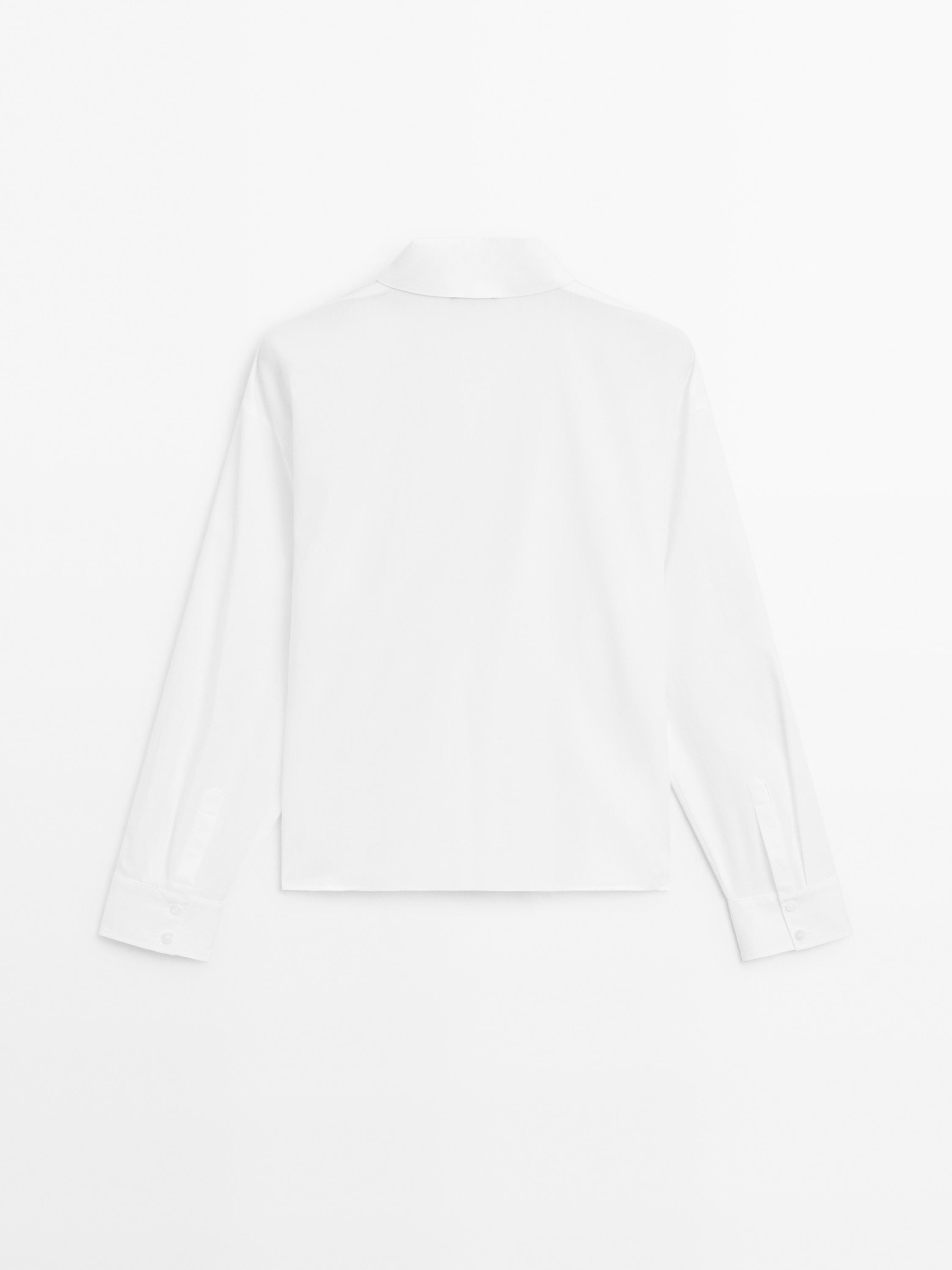 100% cotton shirt with draped asymmetric hem