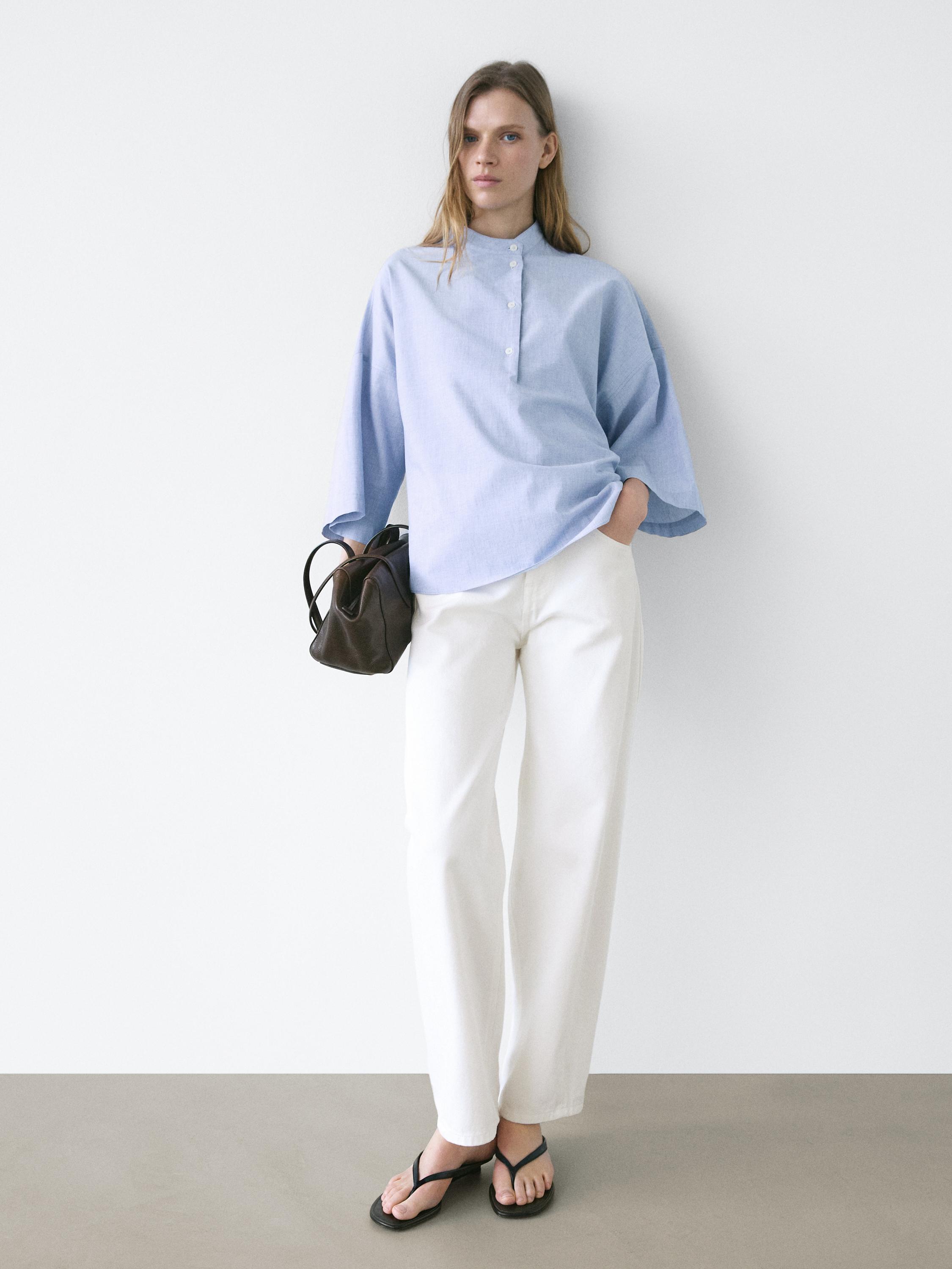 Flowing blouse with buttoned collar detail — Denim blue