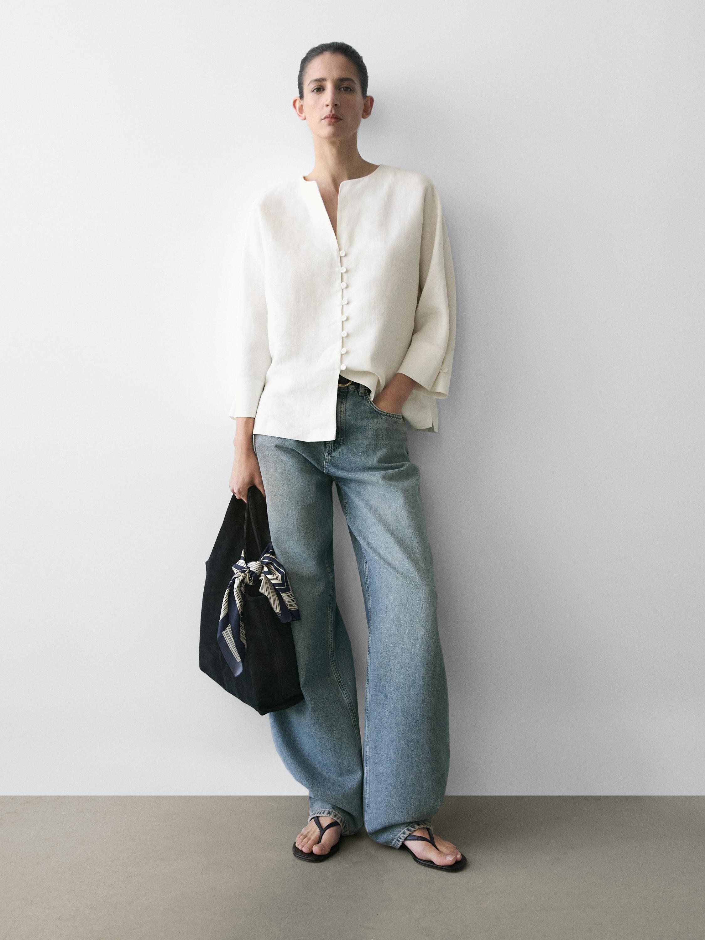 Jakke i hør med knappedetalje