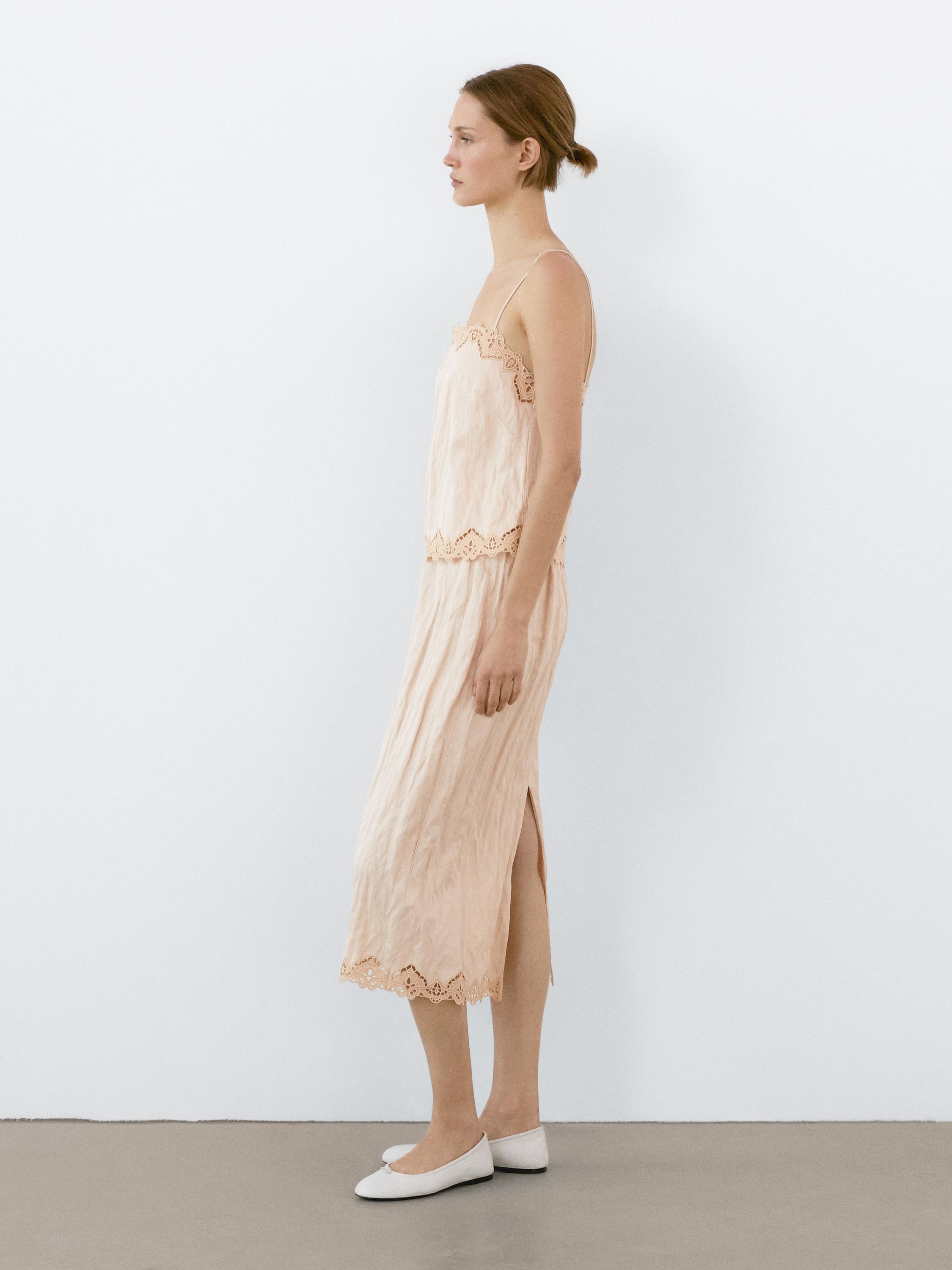 Flowing midi skirt with blonde lace detail