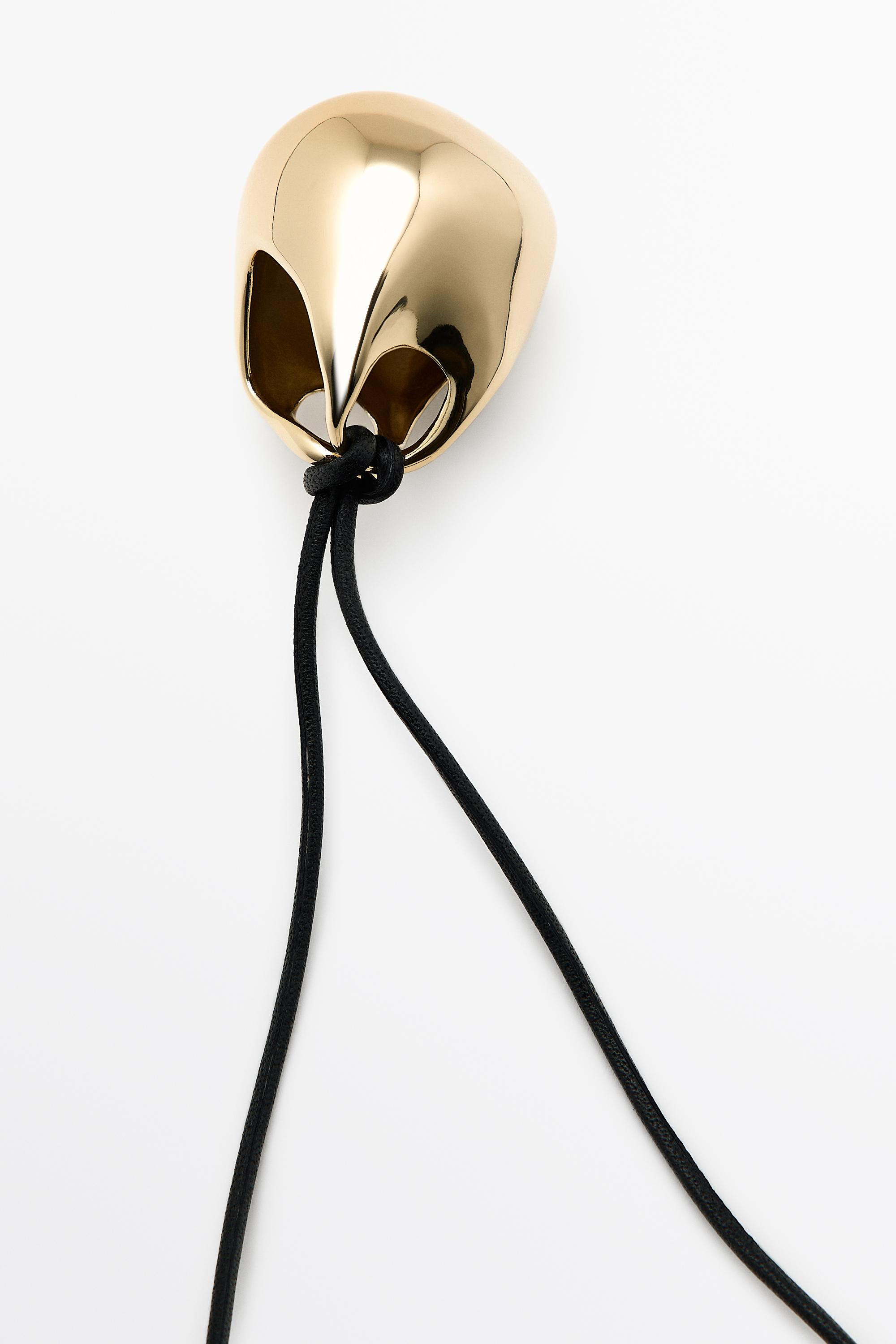 Oval bag pendant necklace — GOLDEN