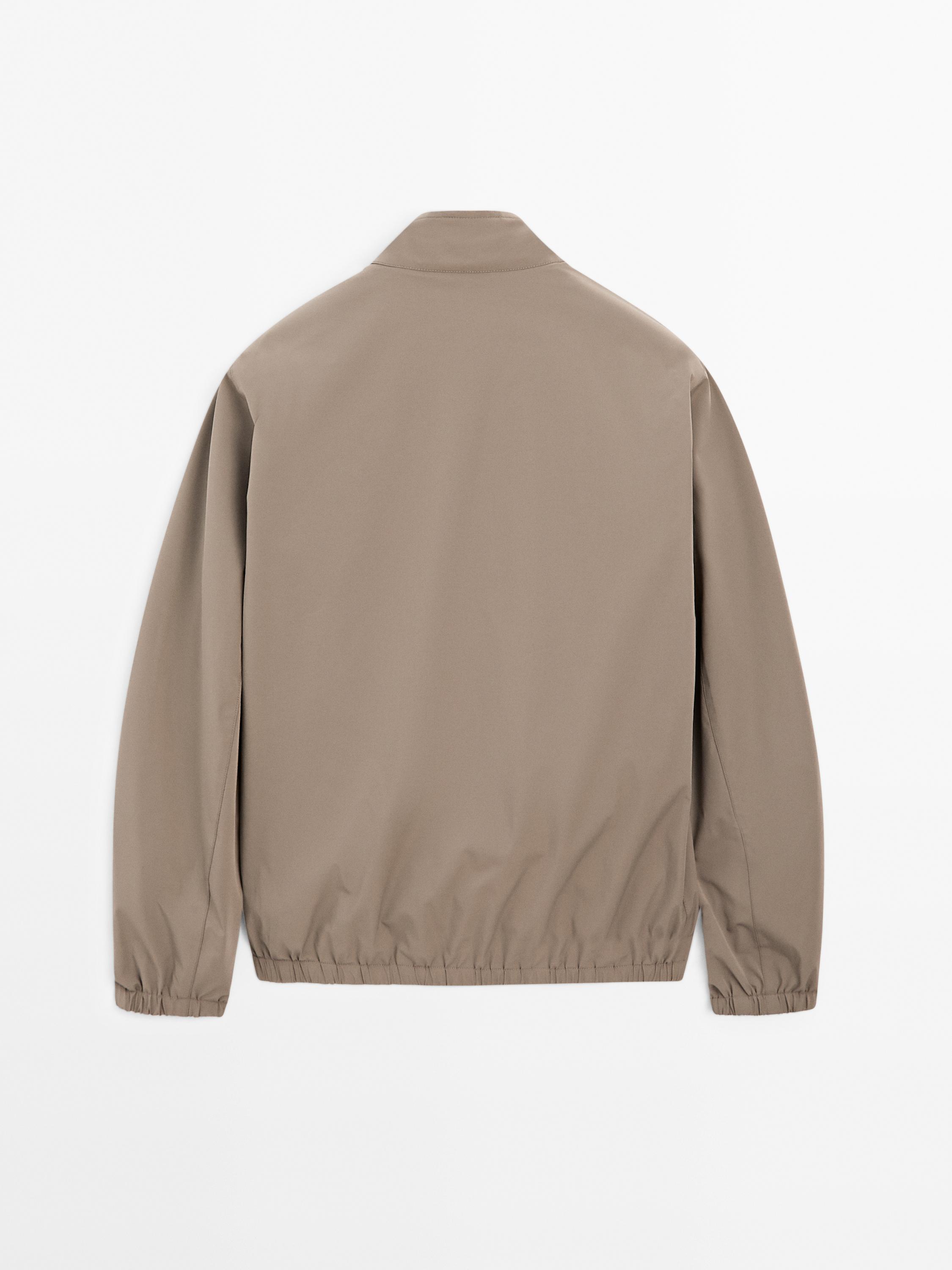Reversible bi-stretch jacket