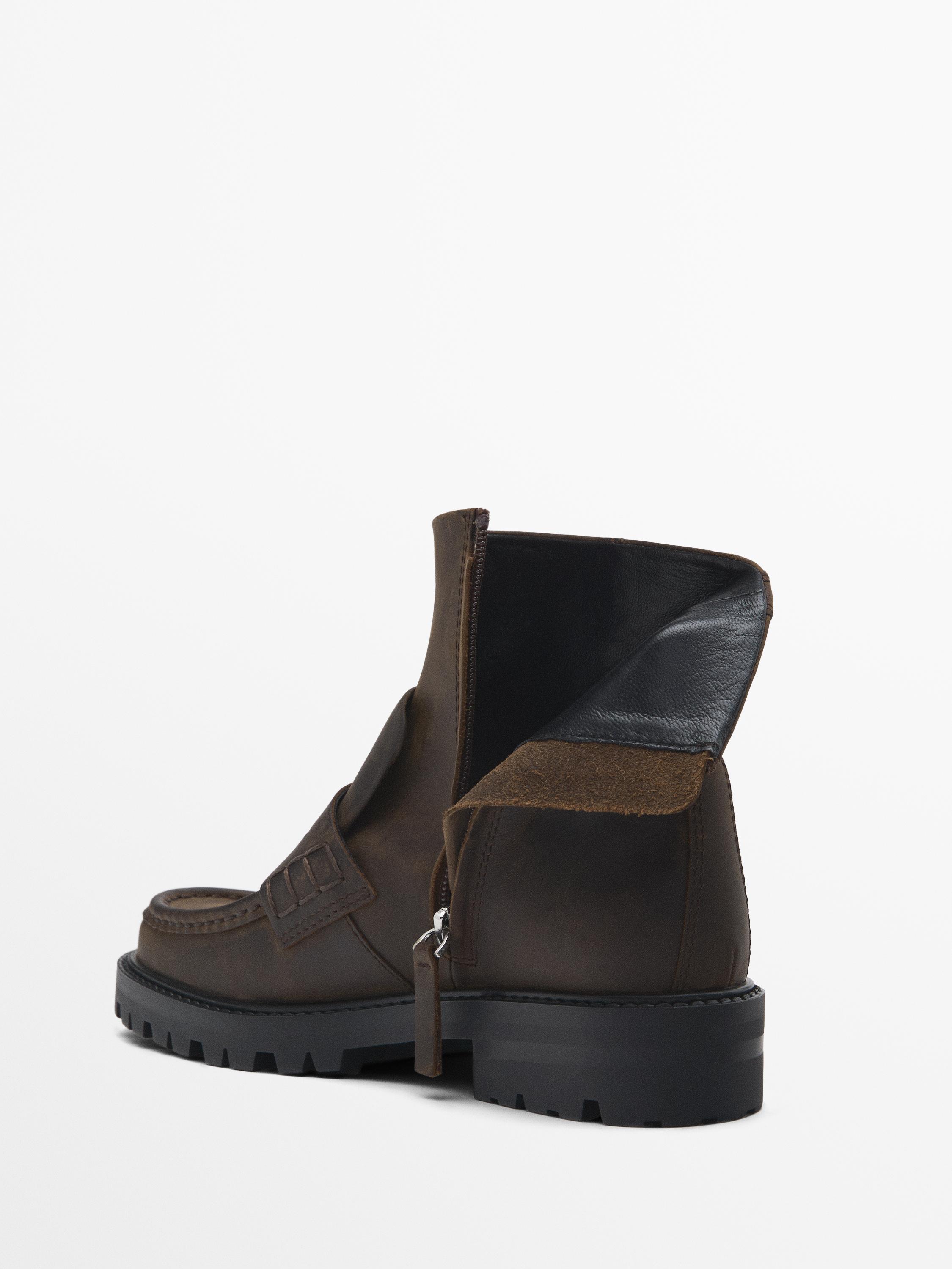 Track sole ankle boots with penny strap