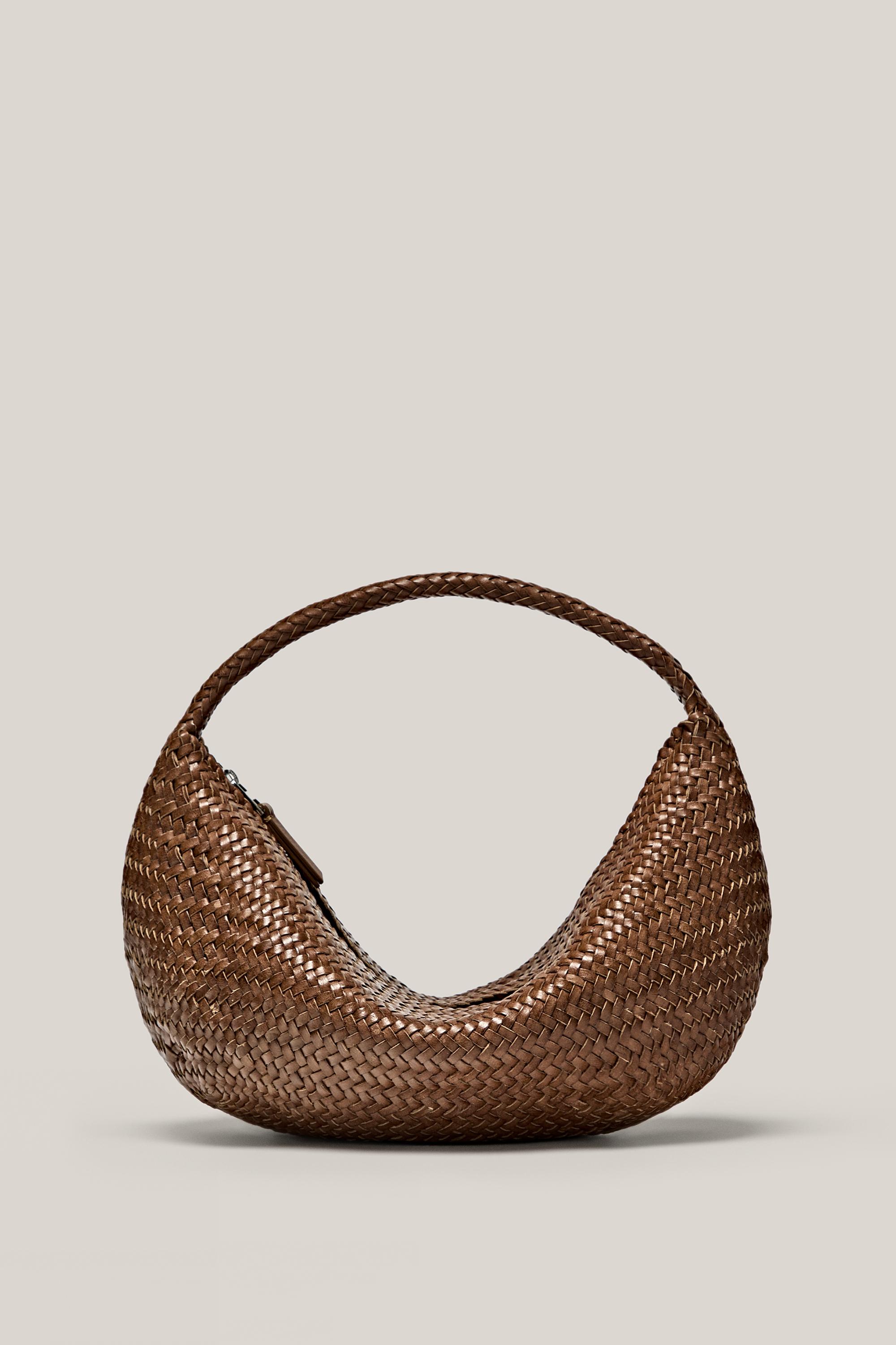 Bolso media luna trenzado piel