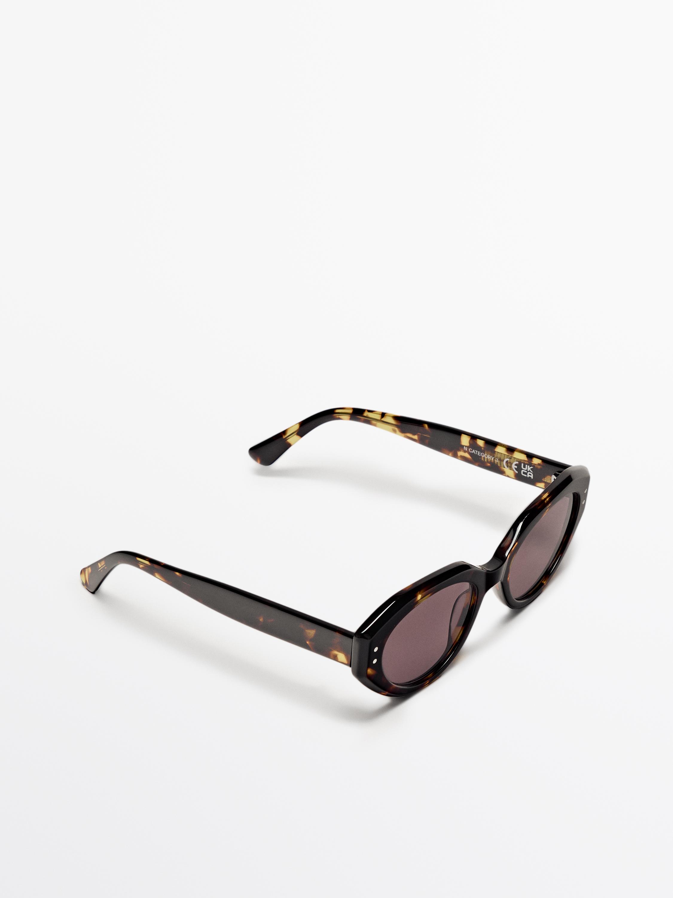 Oval tortoiseshell-effect sunglasses