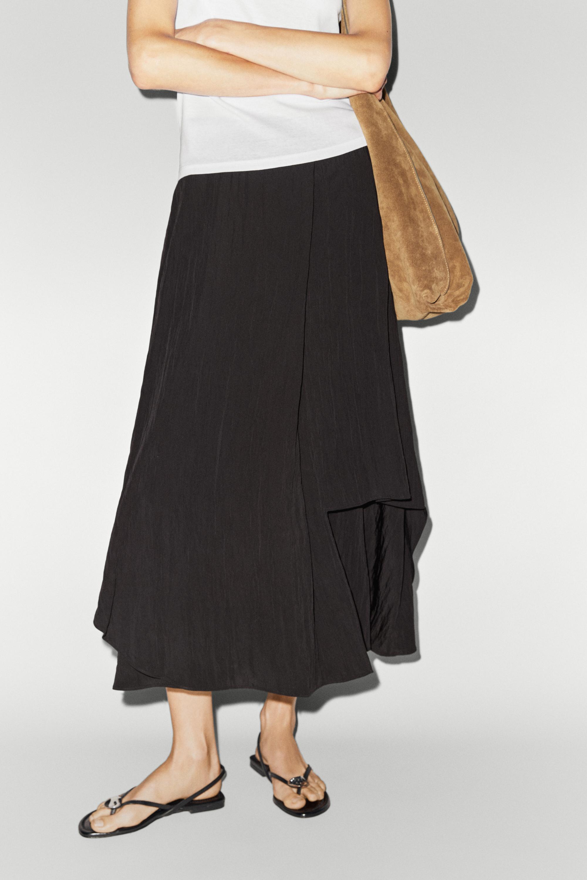 Flowing asymmetrical panel midi skirt — BLACK
