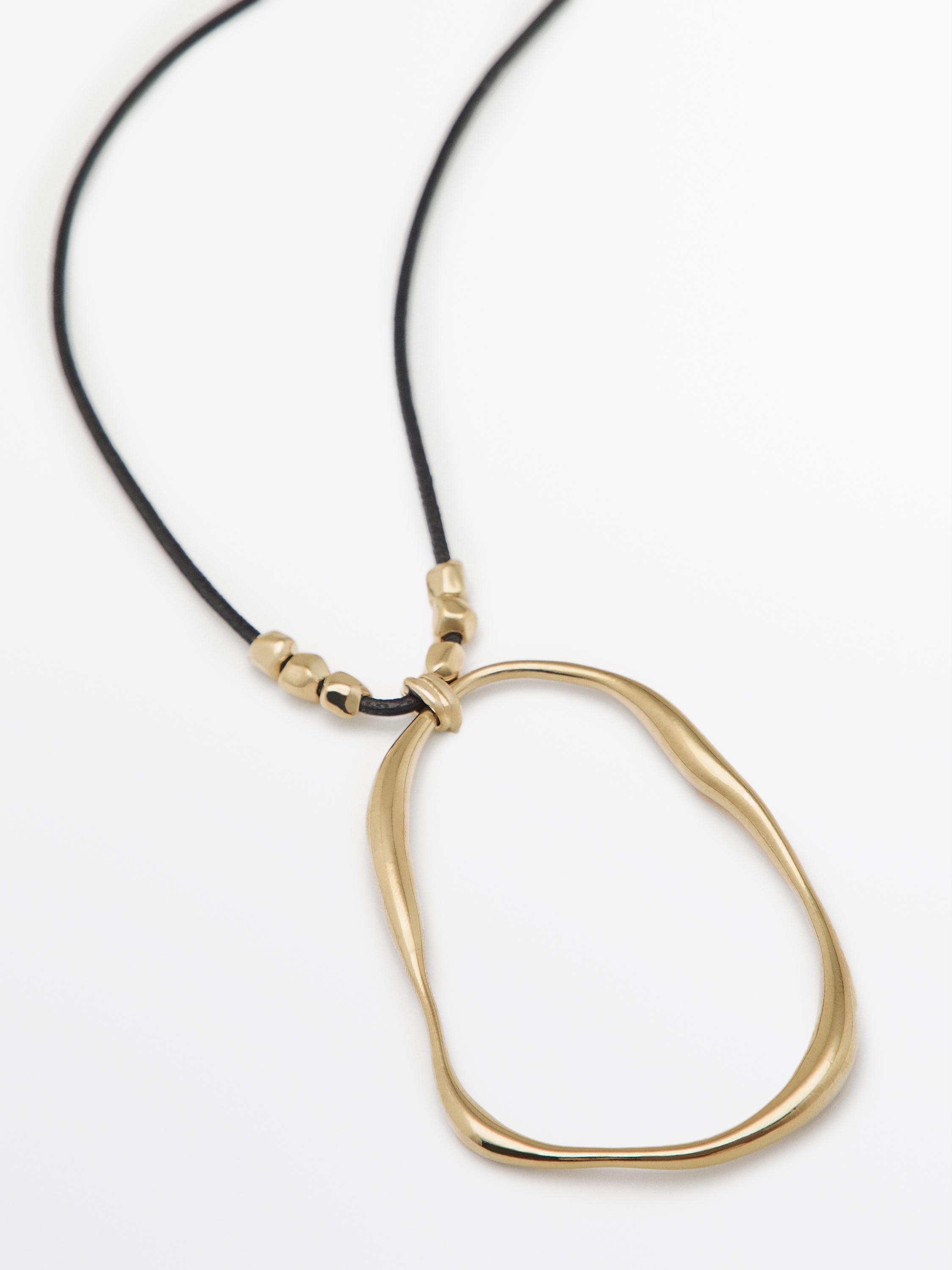 Leather cord necklace with asymmetric piece