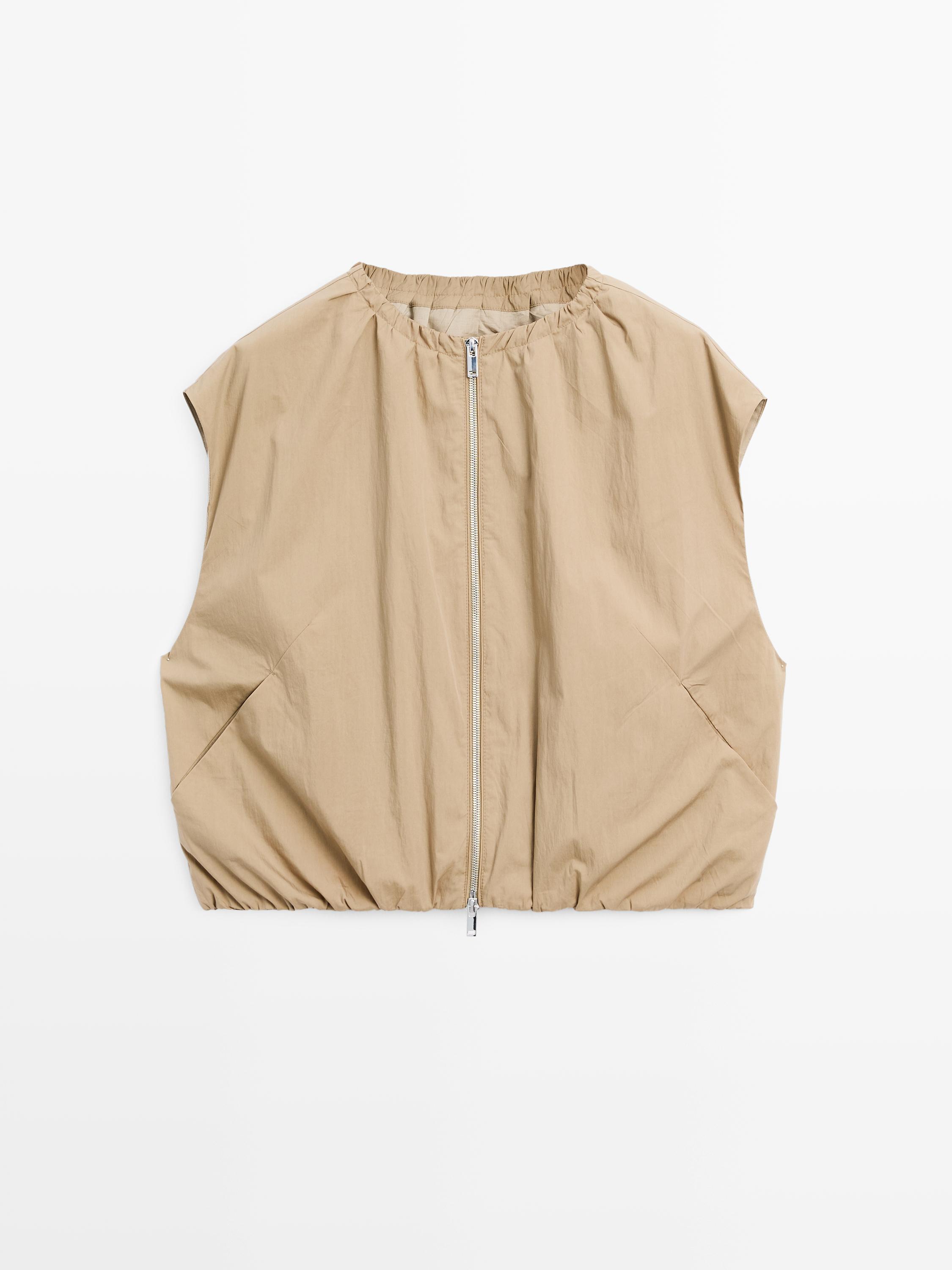Vest with ruffle detail