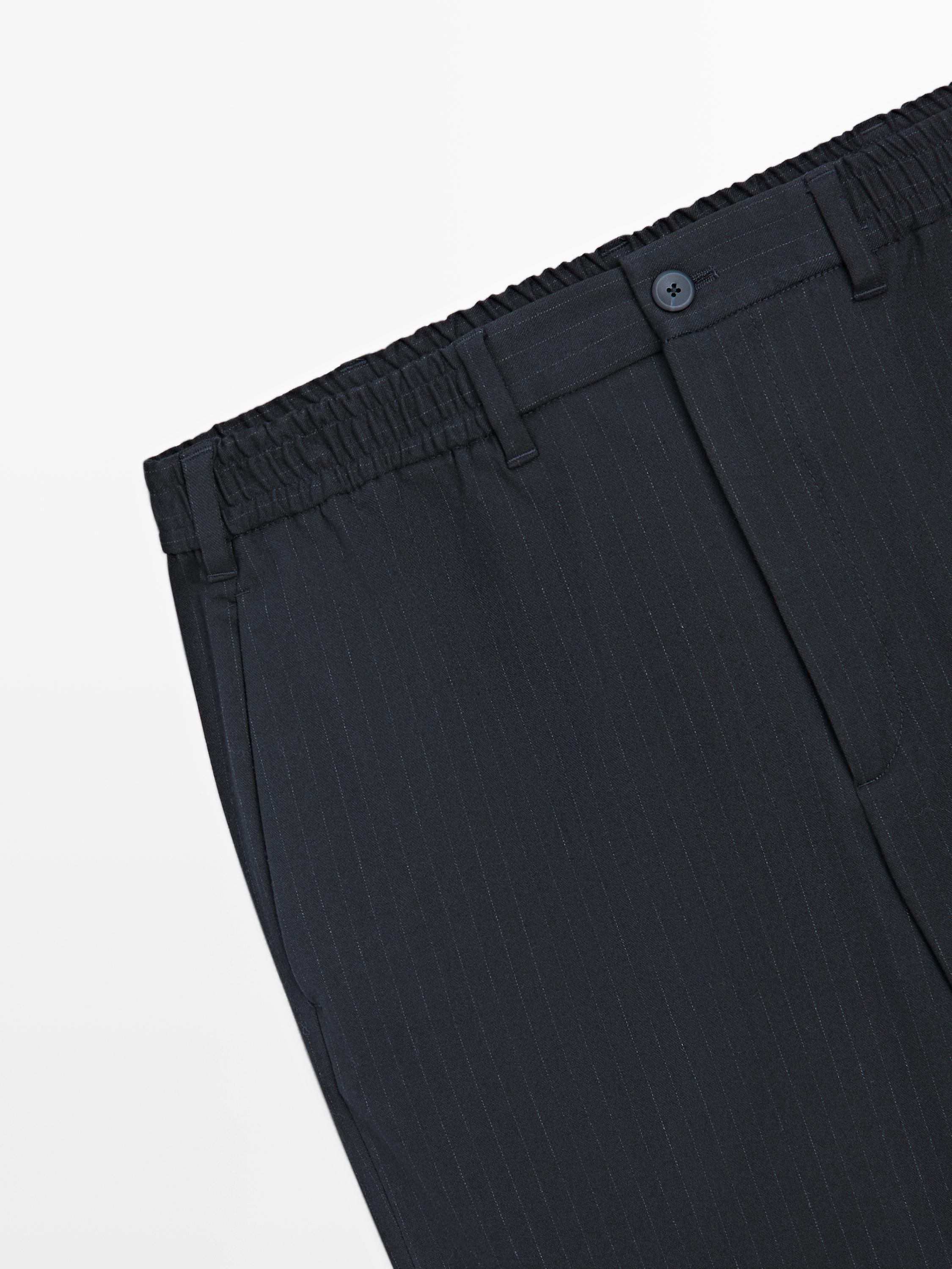 Striped jogger fit trousers — NAVY BLUE