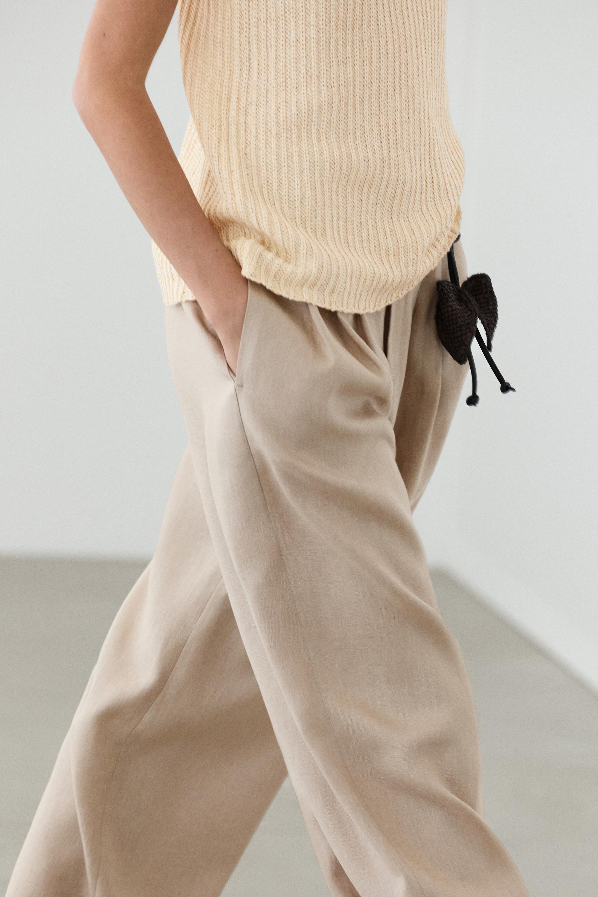 Wide-leg pleated linen trousers — STONE